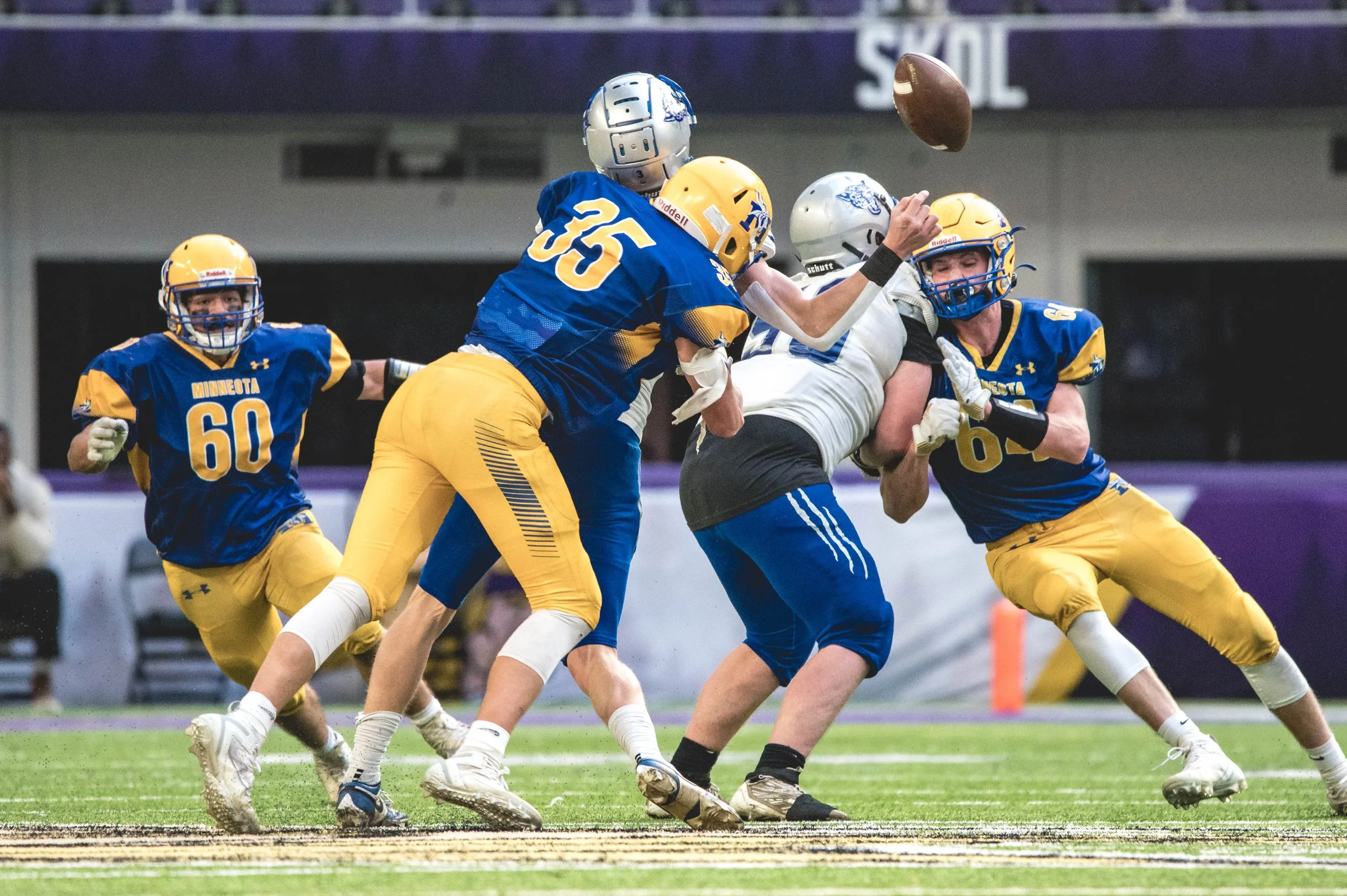 Sawyer DeSmet causes a fumble with a sack.JPG