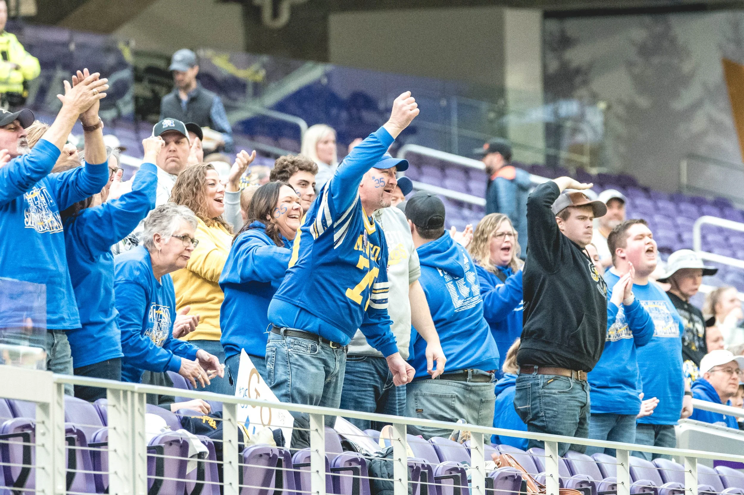 Viking Fans celebrate a big stop.JPG