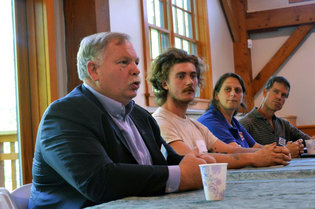Shawn jasper, NH Commissioner of agriculture addresses concerns of local farmers. Pictured righ to left (Commissioner Jasper, Jack Rixey of TRACies community farm, Beth Hodge of echo farm puddings and bruce wooster of picadilly farm. 
