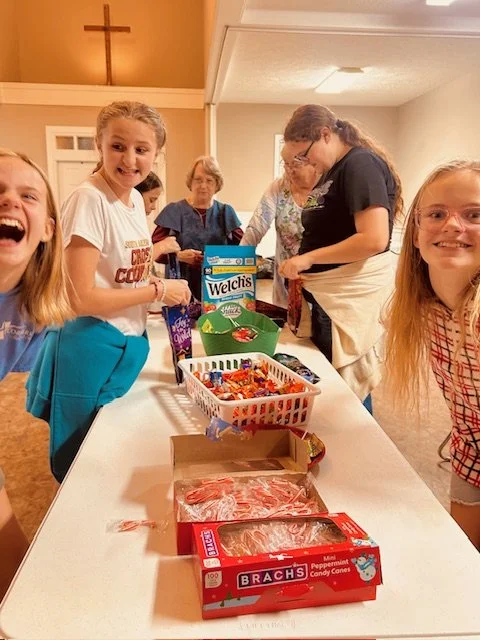 youth service project stuffing stockings 12.25.jpg