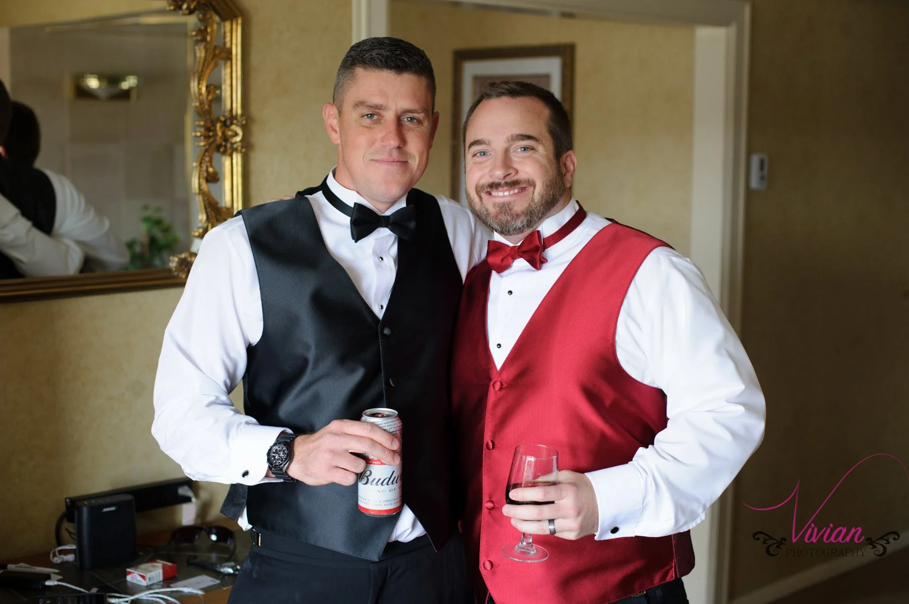 groom-and-bestman-posing-with-beer-cans.jpg