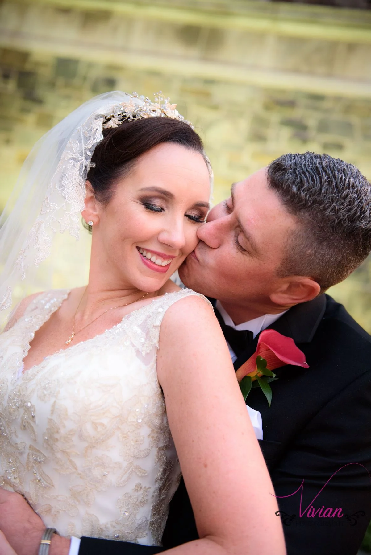 groom-kissing-bride-from-behind.jpg