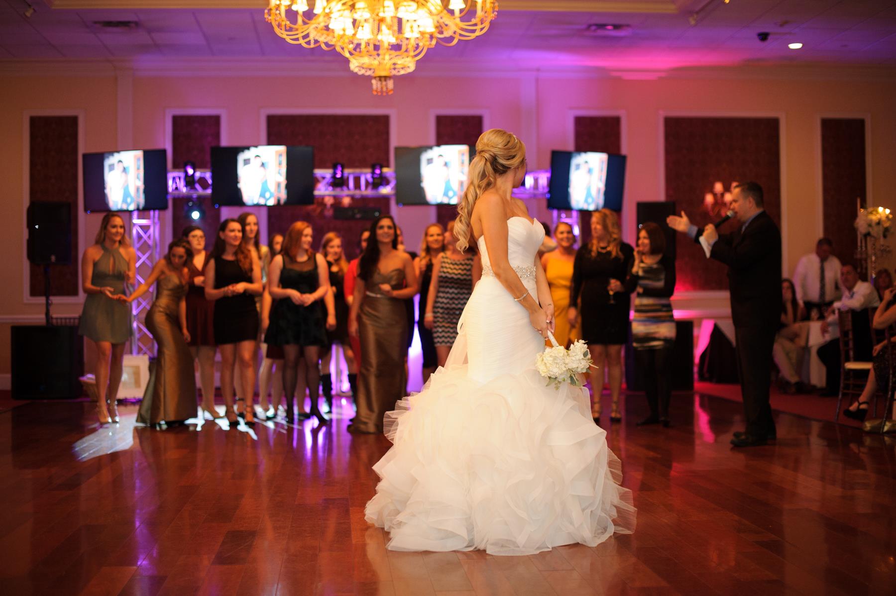 bride-preparing-to-throw-bouquet.jpg