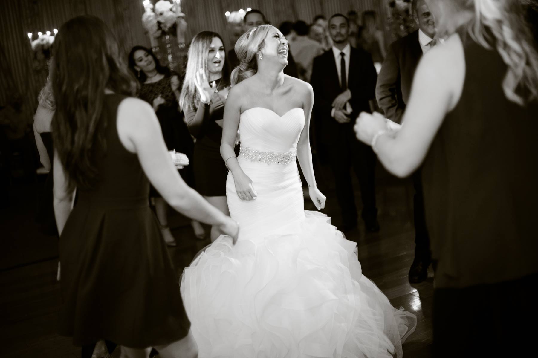 bride-dancing-candidly-on-dance-floor.jpg