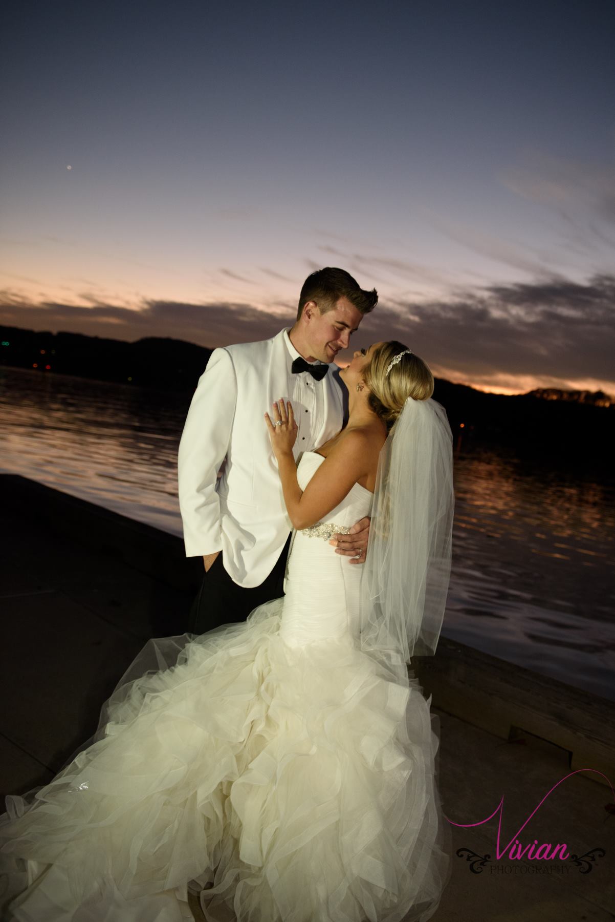 bride-and-groom-kissing-in-sunset.jpg