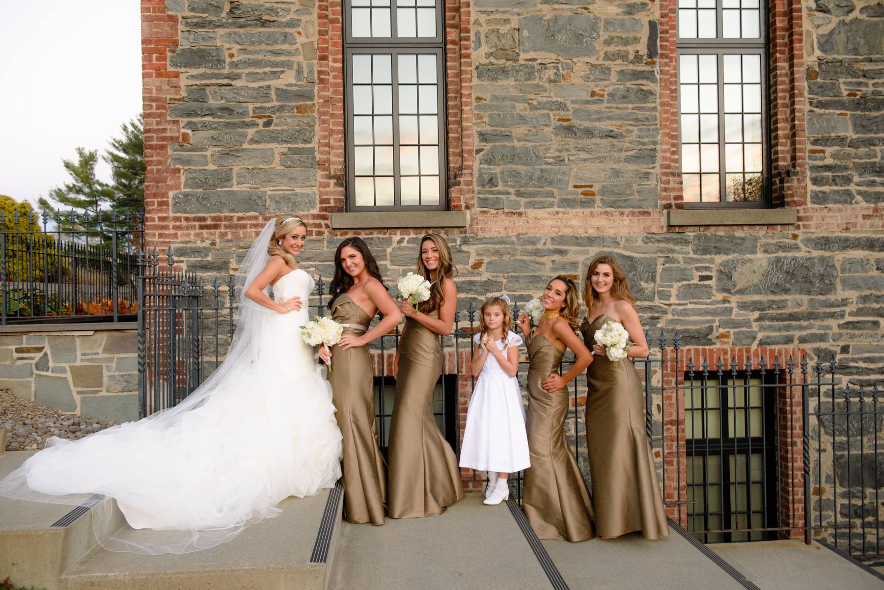 bride-posing-with-bridesmaids.jpg