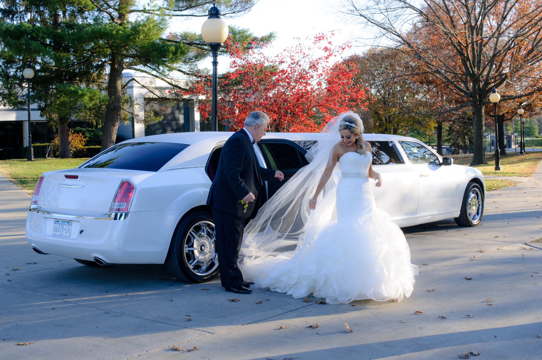 bride-and-father-stepping-out-of-limo.jpg