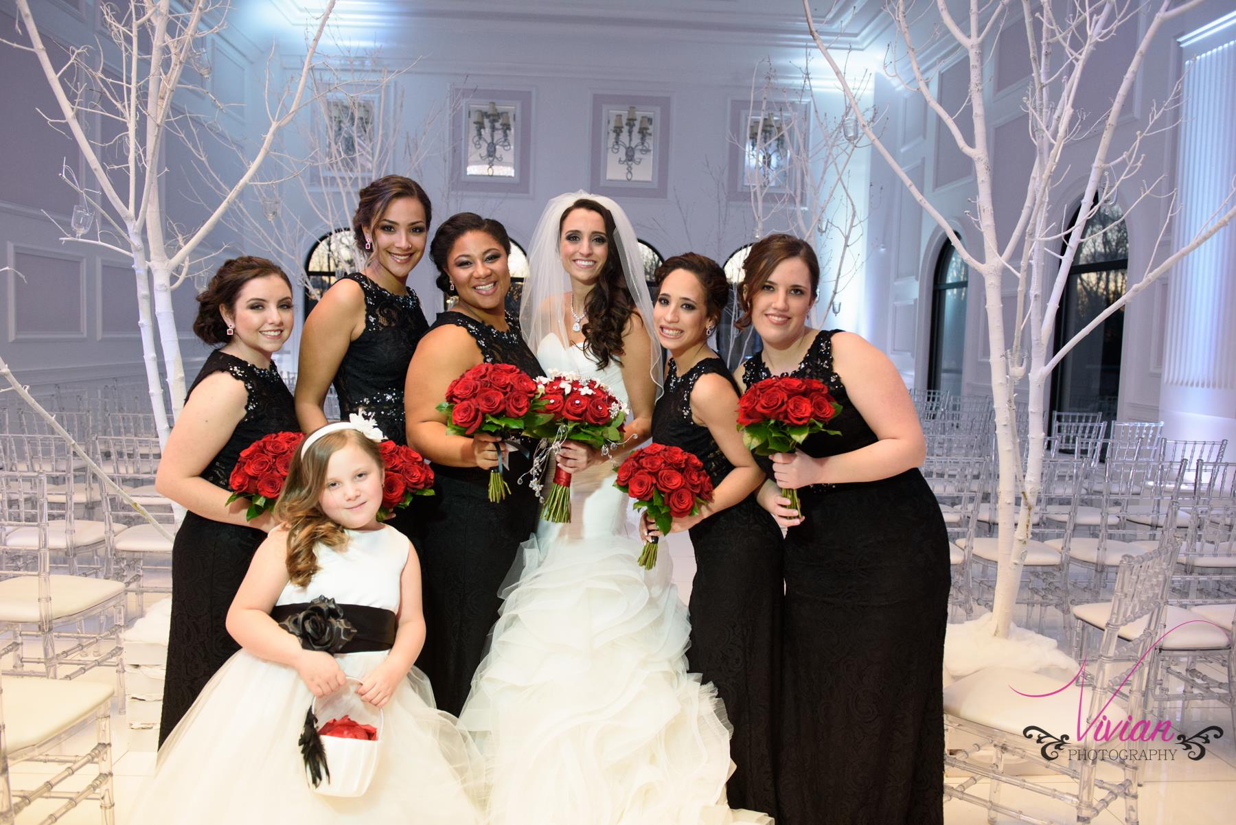 bride-posing-with-bridesmaids-in-winter-wedding-theme.jpg
