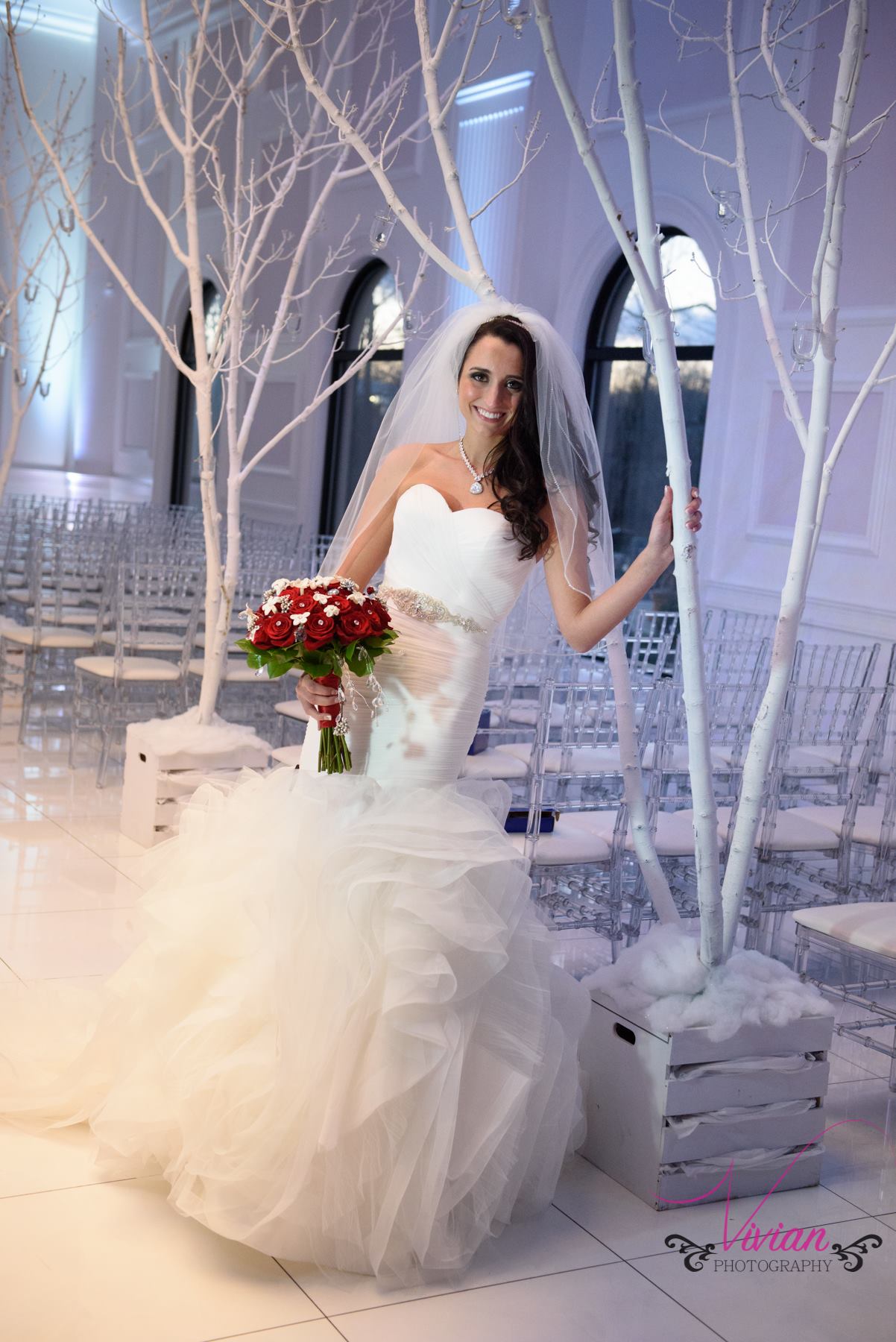 bride-posing-in-winter-wonderland-wedding-venue.jpg
