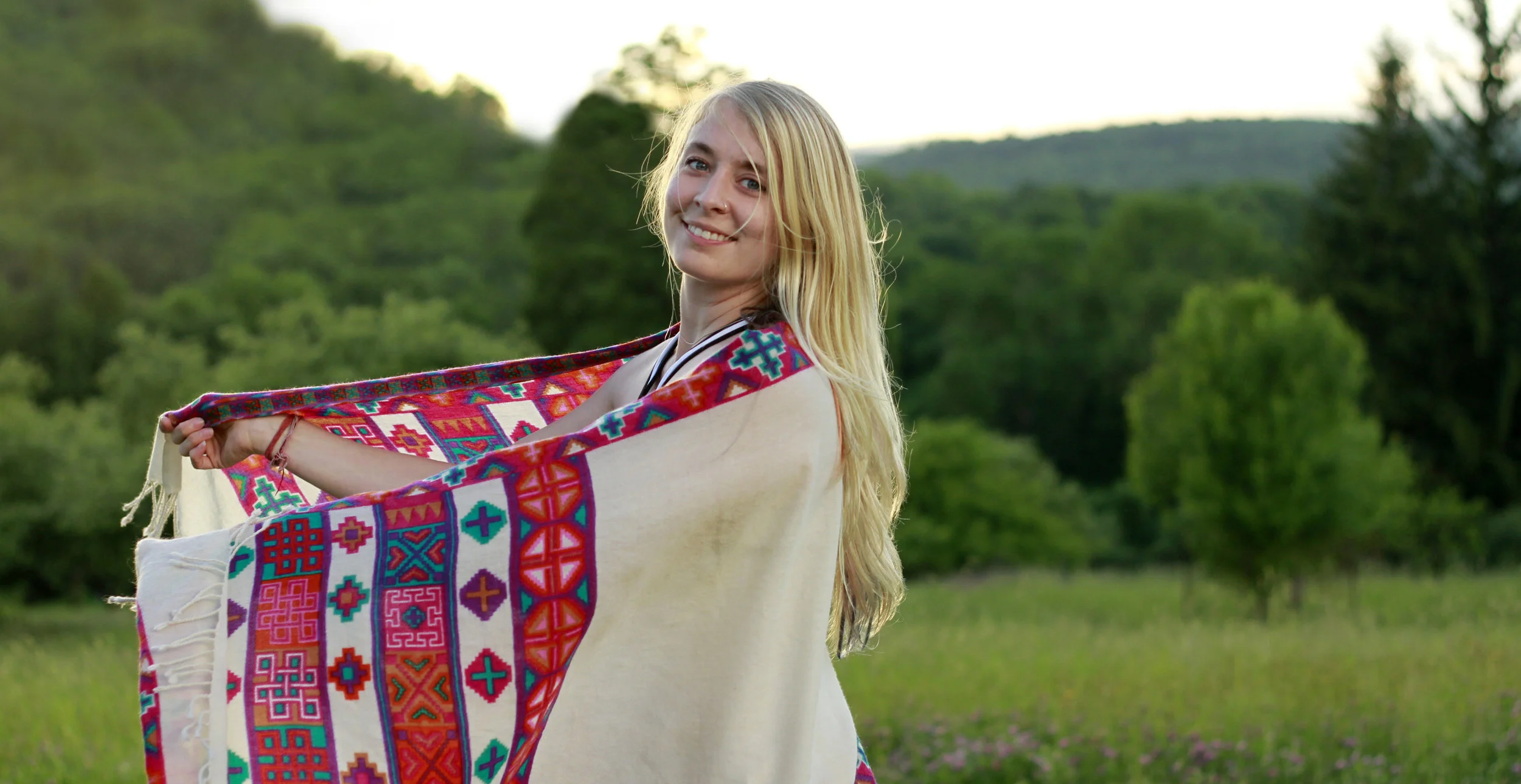 Jessica Sornson is an artist, yoga teacher, organic farmer and eternal optimist dedicated to the propagation of conscious and sustainable lifestyles for both the individual and the community. In addition to a Bachelor of Fine Arts and certification in permaculture design, Jessica is continuously furthering her studies of Yoga. She completed her 200-hour teacher training as well as advanced courses in meditation and kriya with Kia Miller, the creator of a holistic approach with roots in Kundalini and Tantric traditions called Radiant Body Yoga. Jessica’s vision is to inspire, uplift and remind people of the strength in vulnerability and the beauty of the present moment. Her latest artwork ranges from greeting cards to rainbow garlands made from sustainably sourced fabrics to saw blade-wall clocks painted with cosmic floral designs to jewelry with love and devotion infused in each gem-stone. With the integration of yoga, permaculture and creative expression, she has found healthy harmonious platforms from which to share loving awareness. 