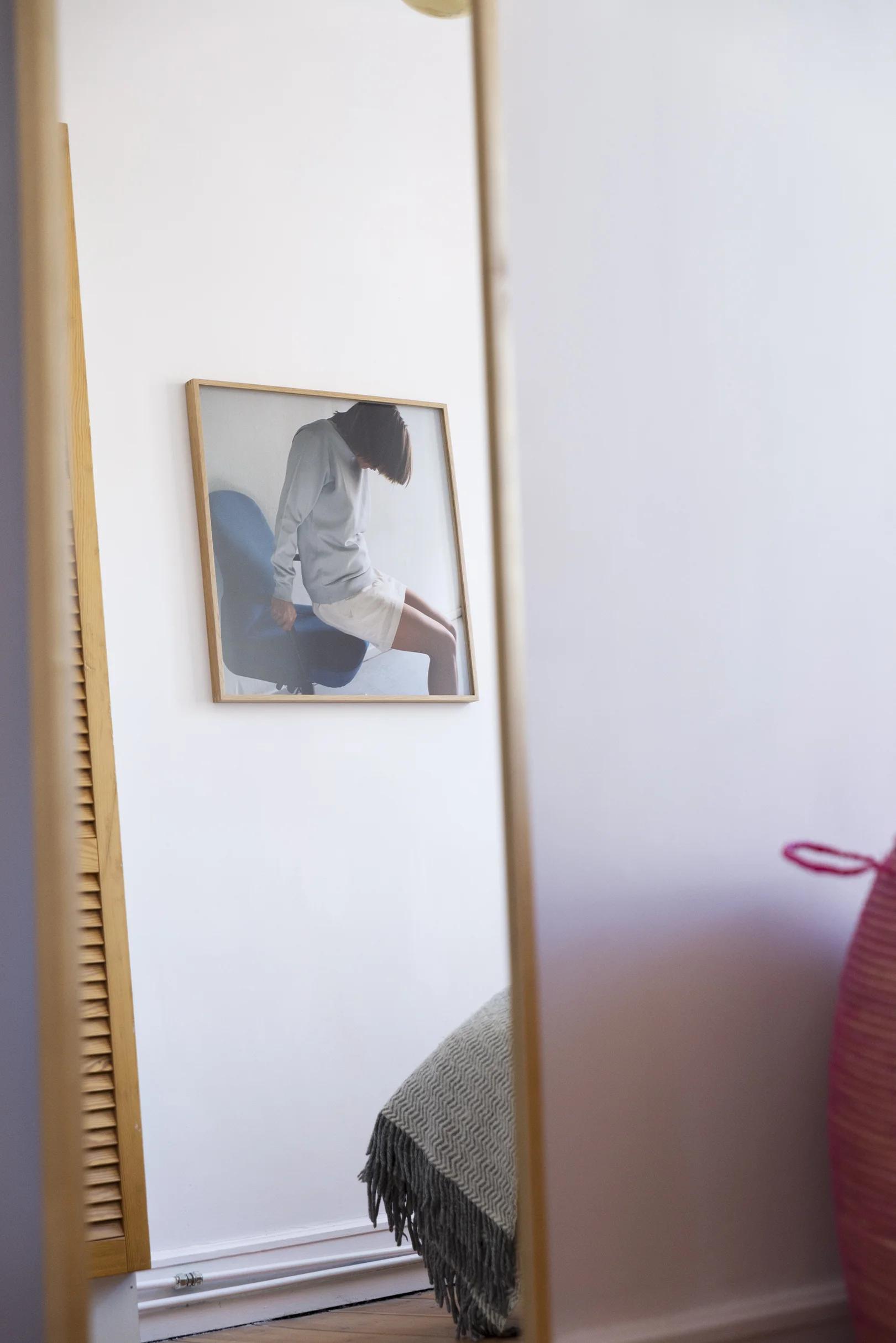 Onbalanced (2009), inkjet print, 60x60cm, Ingrid Eggen mirror, laudrybasket from Senegal, wool blanket