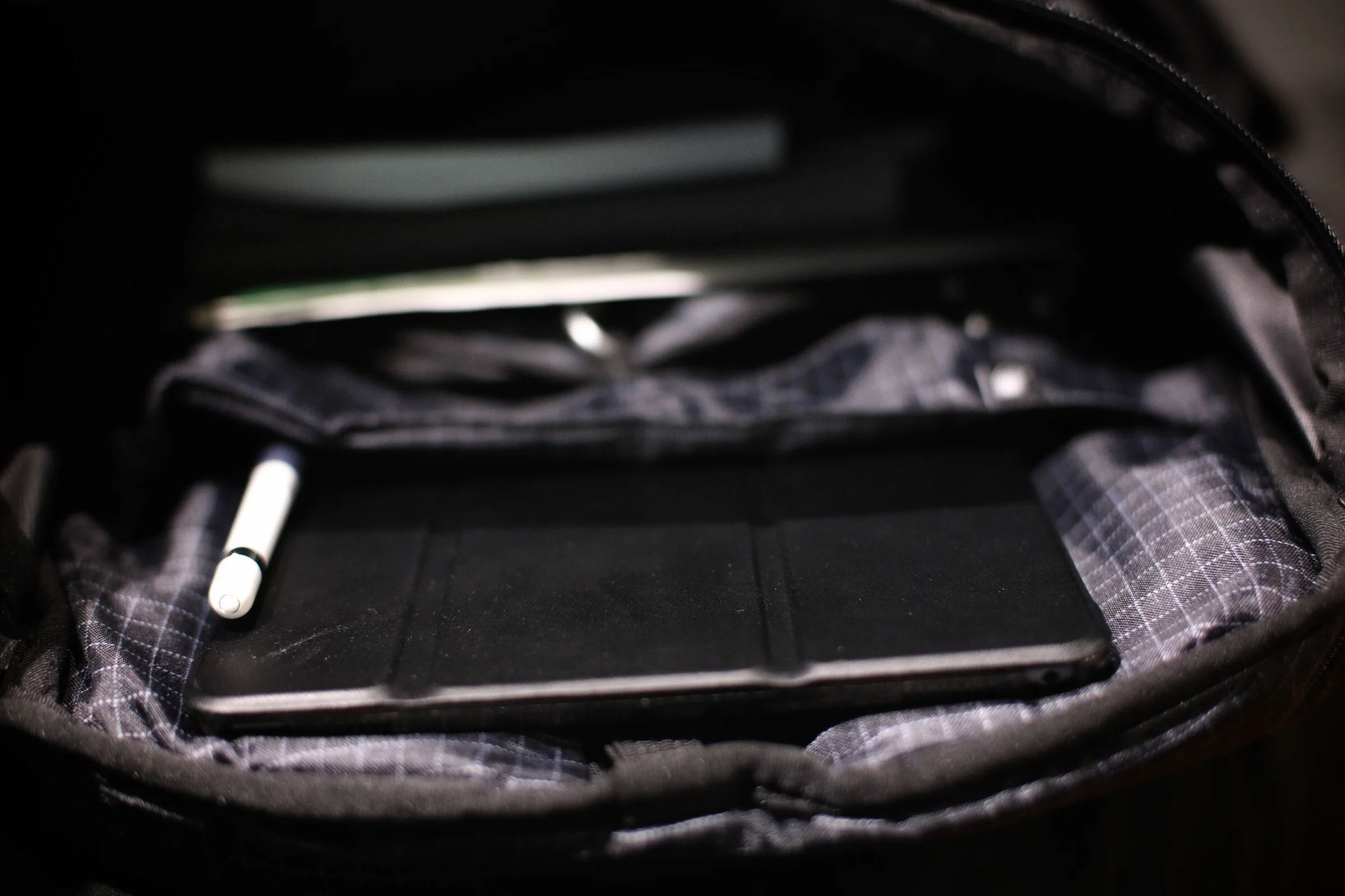 With the magnetic sleeve accessory I can place the iPad in a backpack with the pencil magnetically attached to the smart cover and it will hold on even after a car ride home.