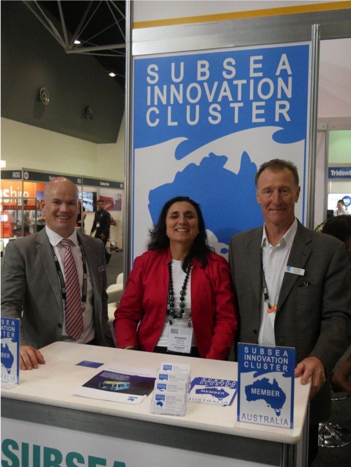 Marius Martens, representing Intecsea (SICA member), Voula Terzoudi representing Woodside (SICA member) and Ray Farrier Cluster Manager at the Subsea Innovation Cluster booth part of the Australia Subsea Pavilion.
