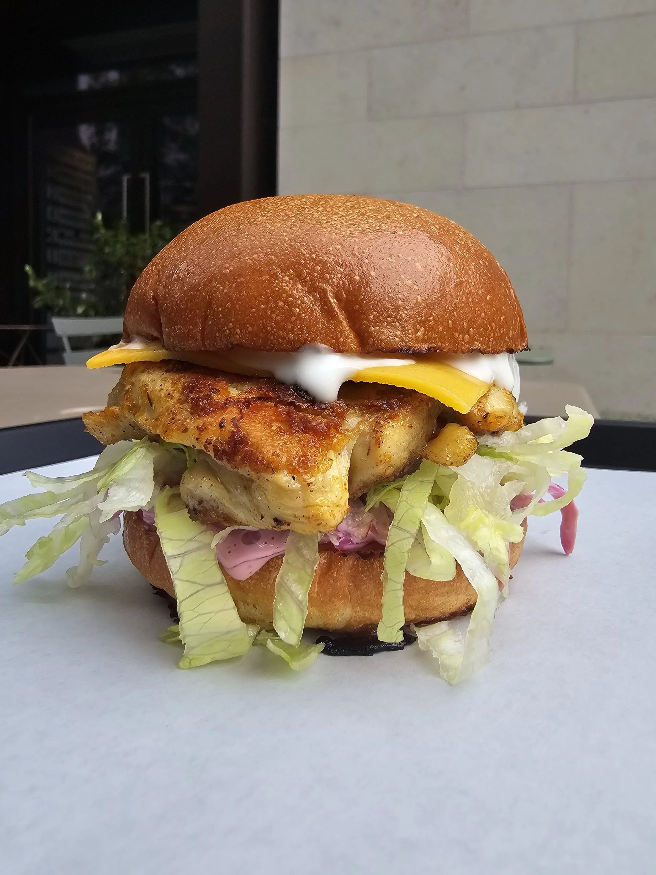 CHEESEBURGERS AT THE THREE COMPASSES DALSTON CHICKEN BURGER.jpg