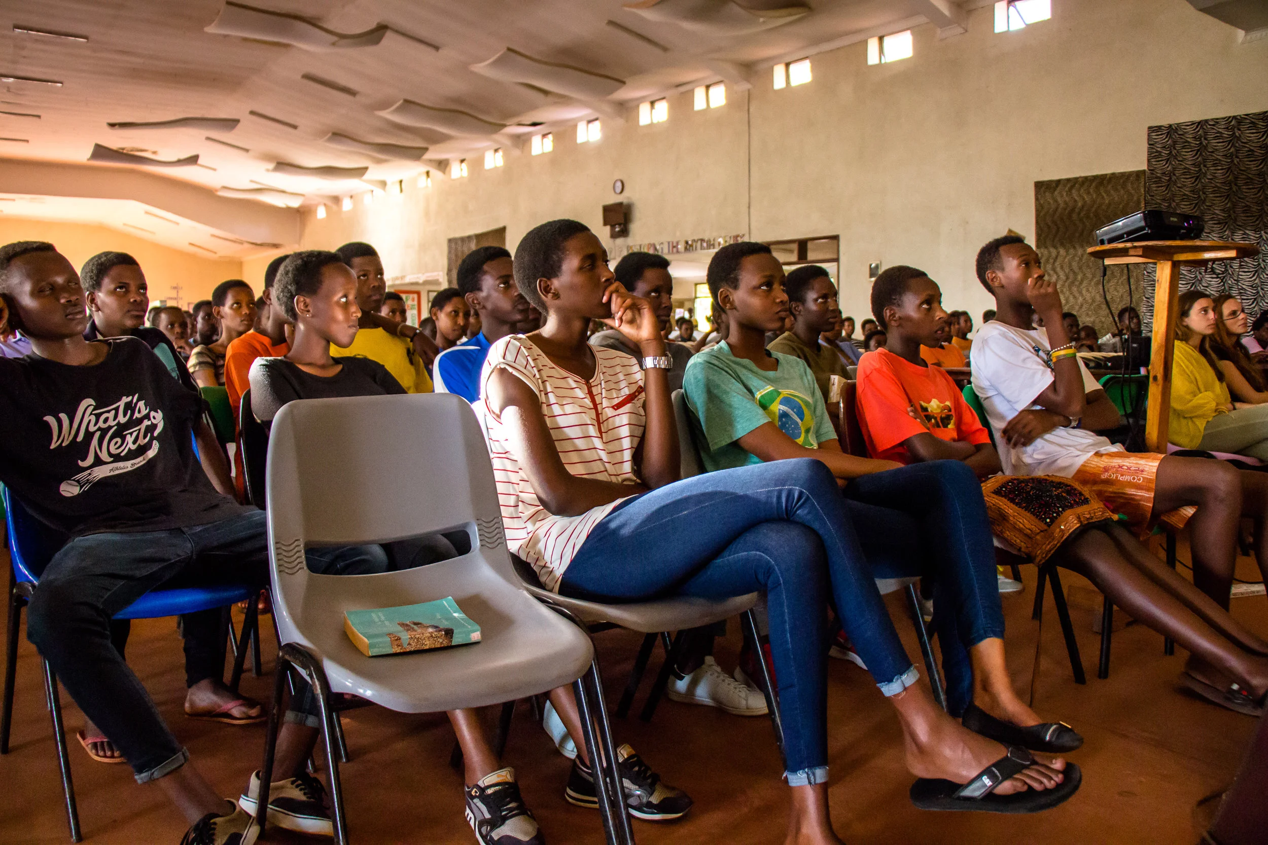 Students listening at a presentation on social businesses by the Sundara team