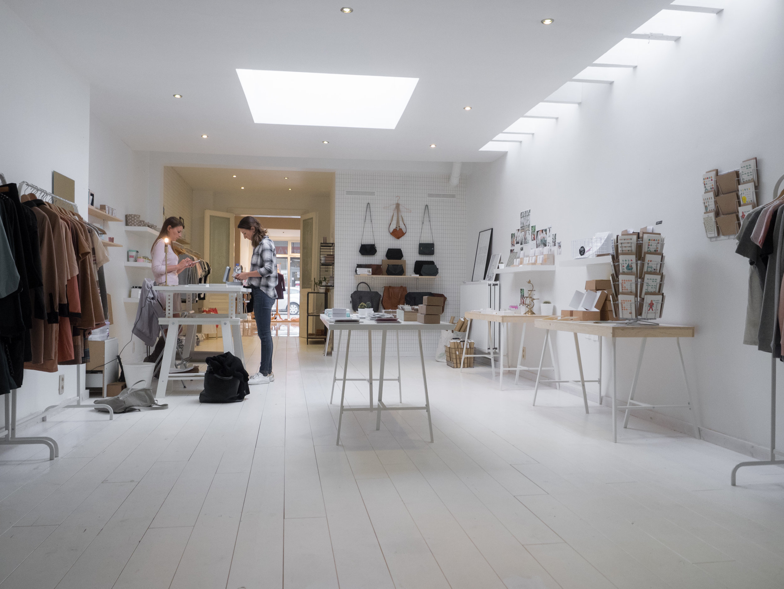 The pop-up store is spacious and bright.