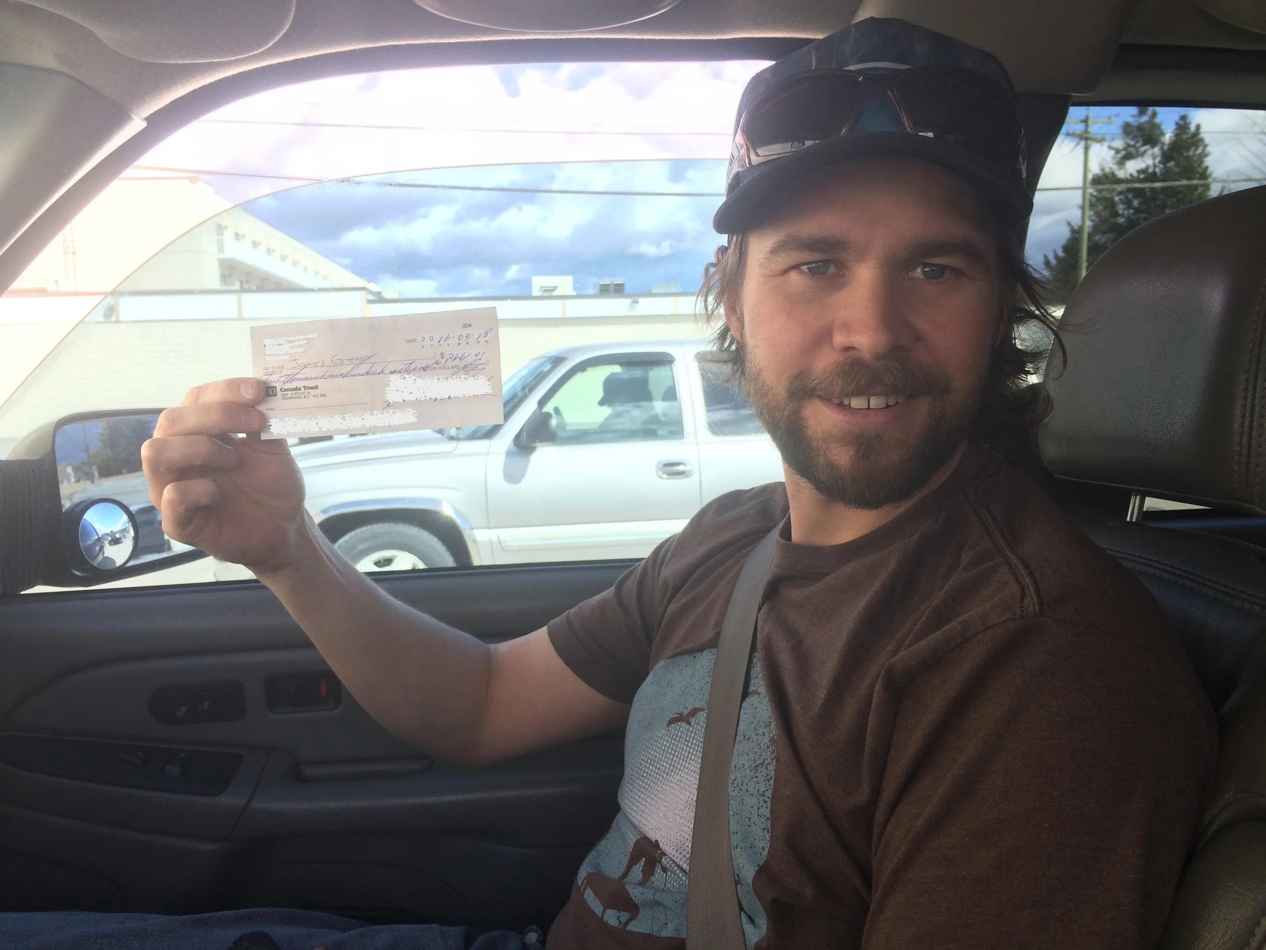 The hubby with the first cheque he ever earned in his own business.