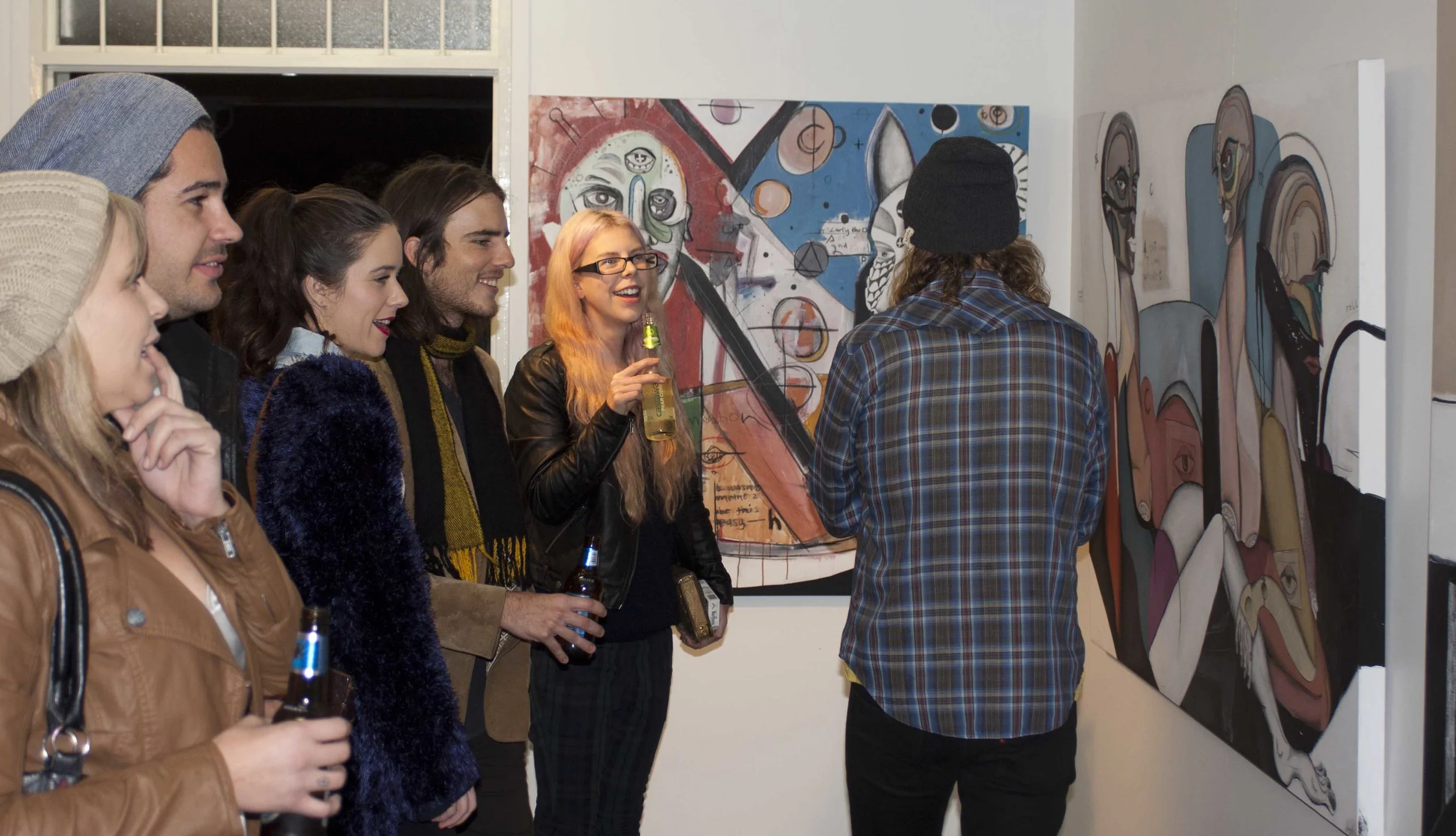 group shot in front of paintings.jpg