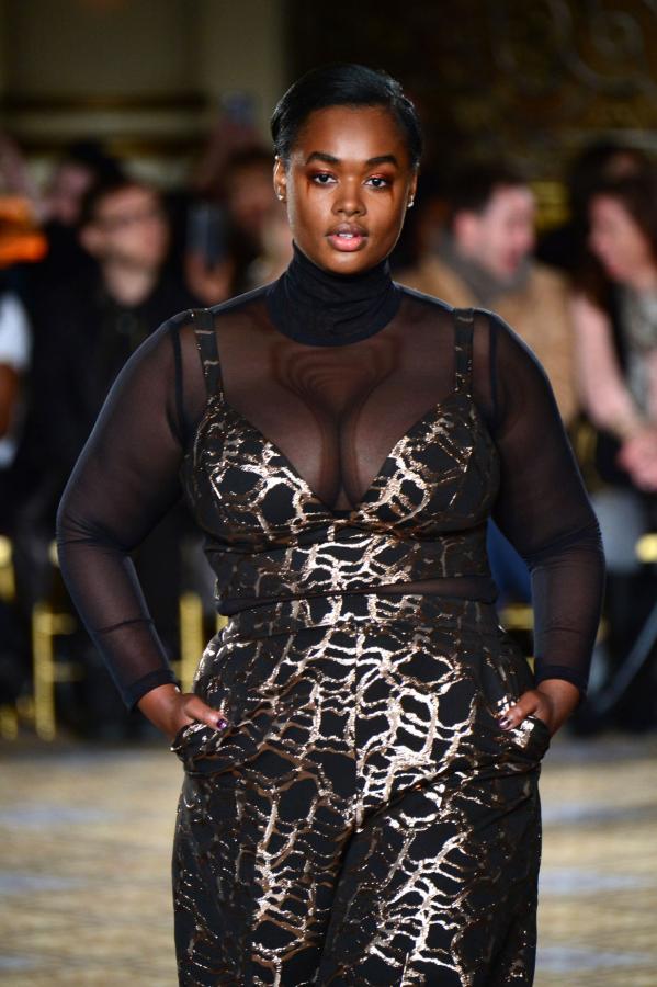 A plus-sized model sports Christian Siriano's design at his 2017 New York Fashion Week Show.