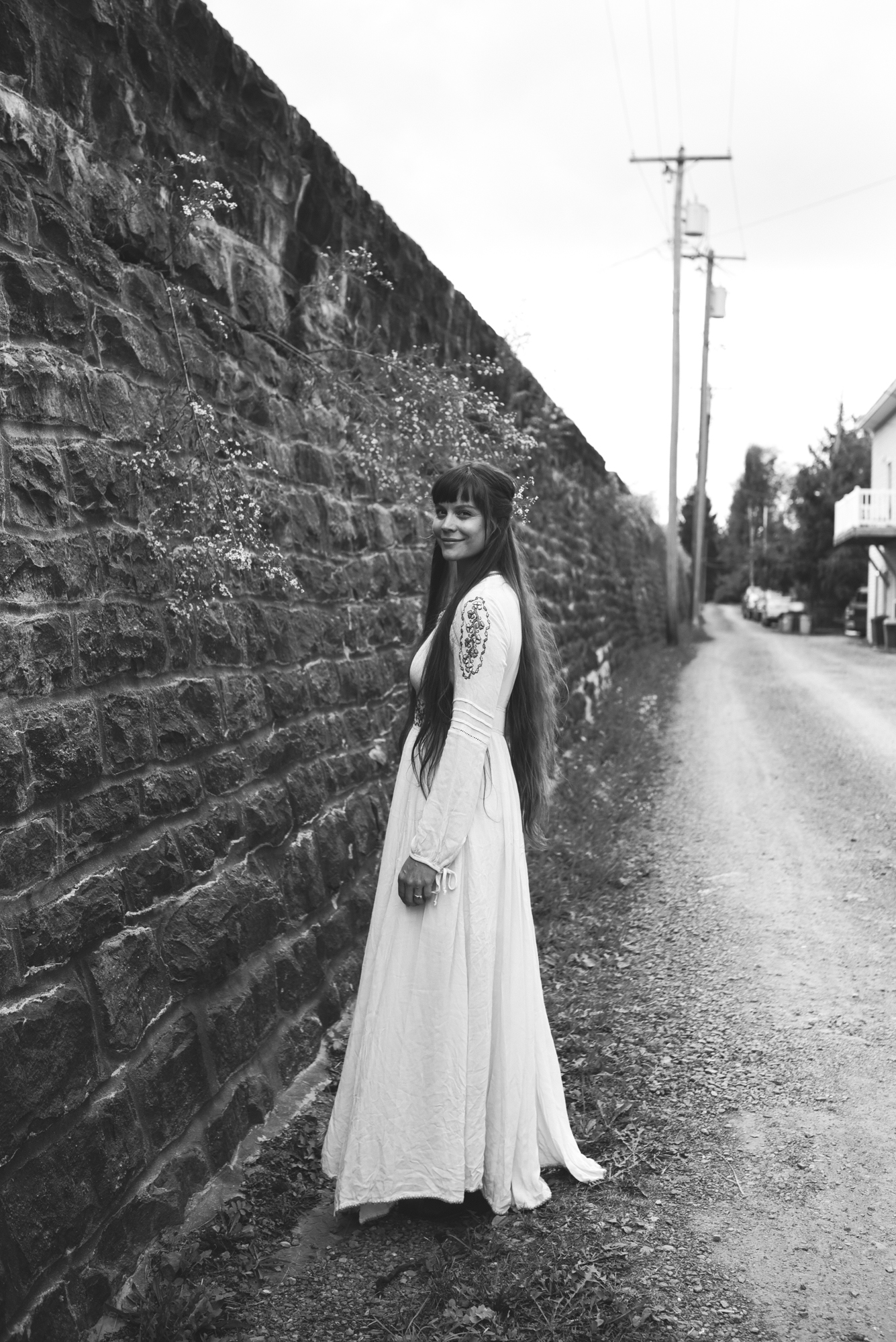  Mountains, Outdoors, Rustic, West Virginia, Maryland Wedding Photographer, DIY, Casual, Bride posing and smiling before ceremony, Romantic and Boho bride, black and white photo 