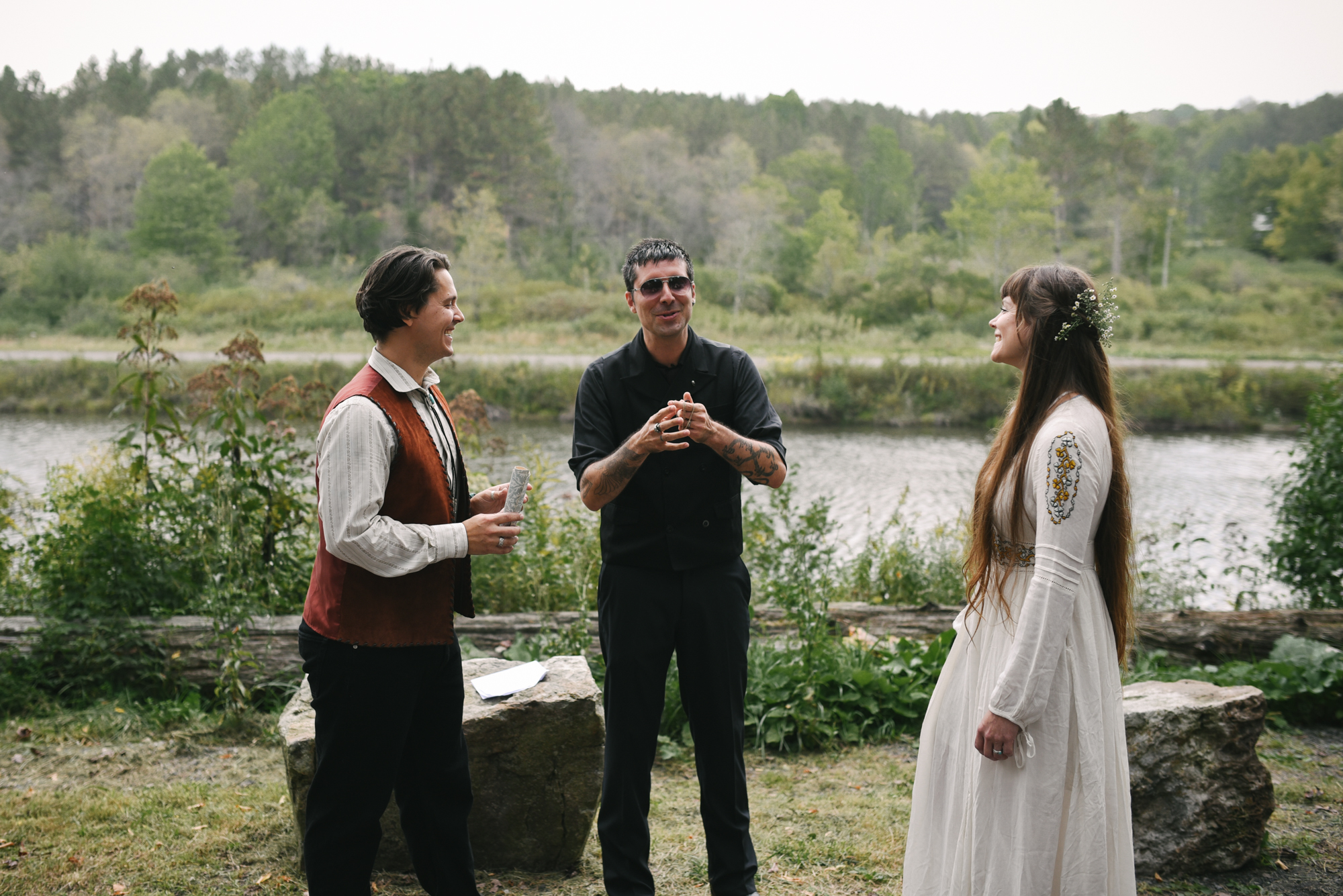  Mountain Wedding, Outdoors, Rustic, West Virginia, Maryland Wedding Photographer, DIY, Casual, bride and groom standing in front of officiant, Embroidered wedding dress 
