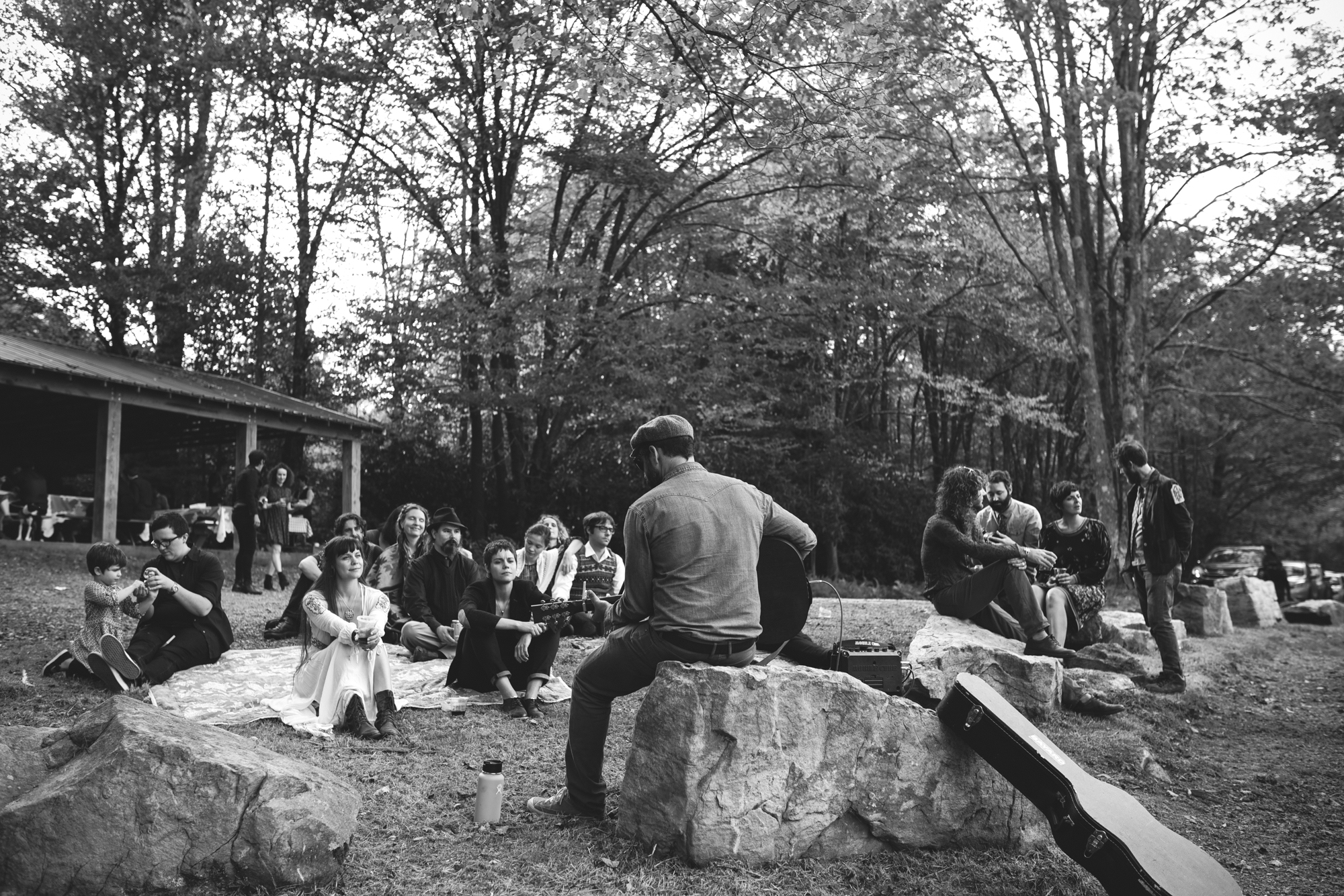  Mountain Wedding, Outdoors, Rustic, West Virginia, Maryland Wedding Photographer, DIY, Casual, friend playing guitar in front of guests, black and white photo 