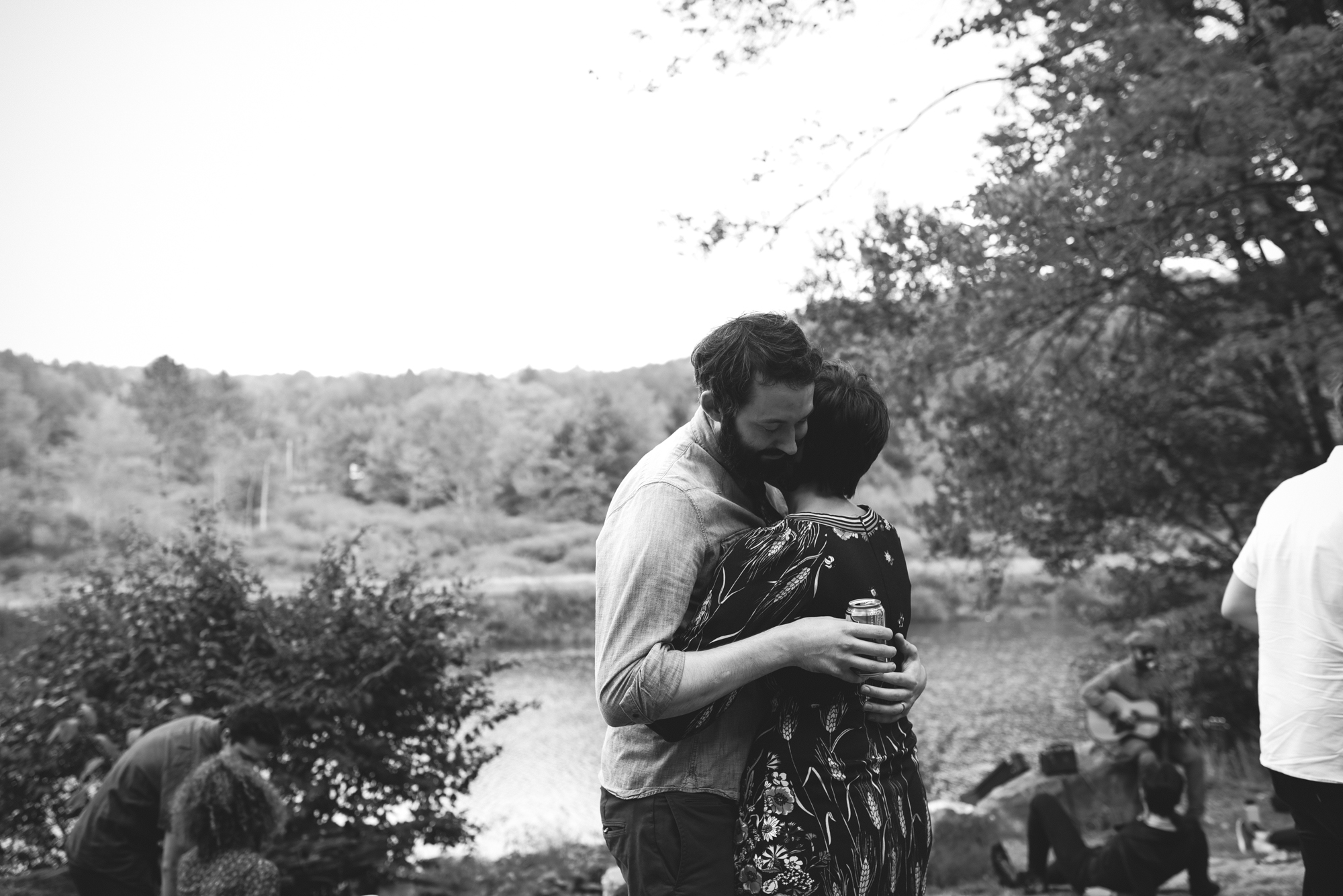 Mountain Wedding, Outdoors, Rustic, West Virginia, Maryland Wedding Photographer, DIY, Casual, couple hugging next to river, Blackwater river, black and white photo 