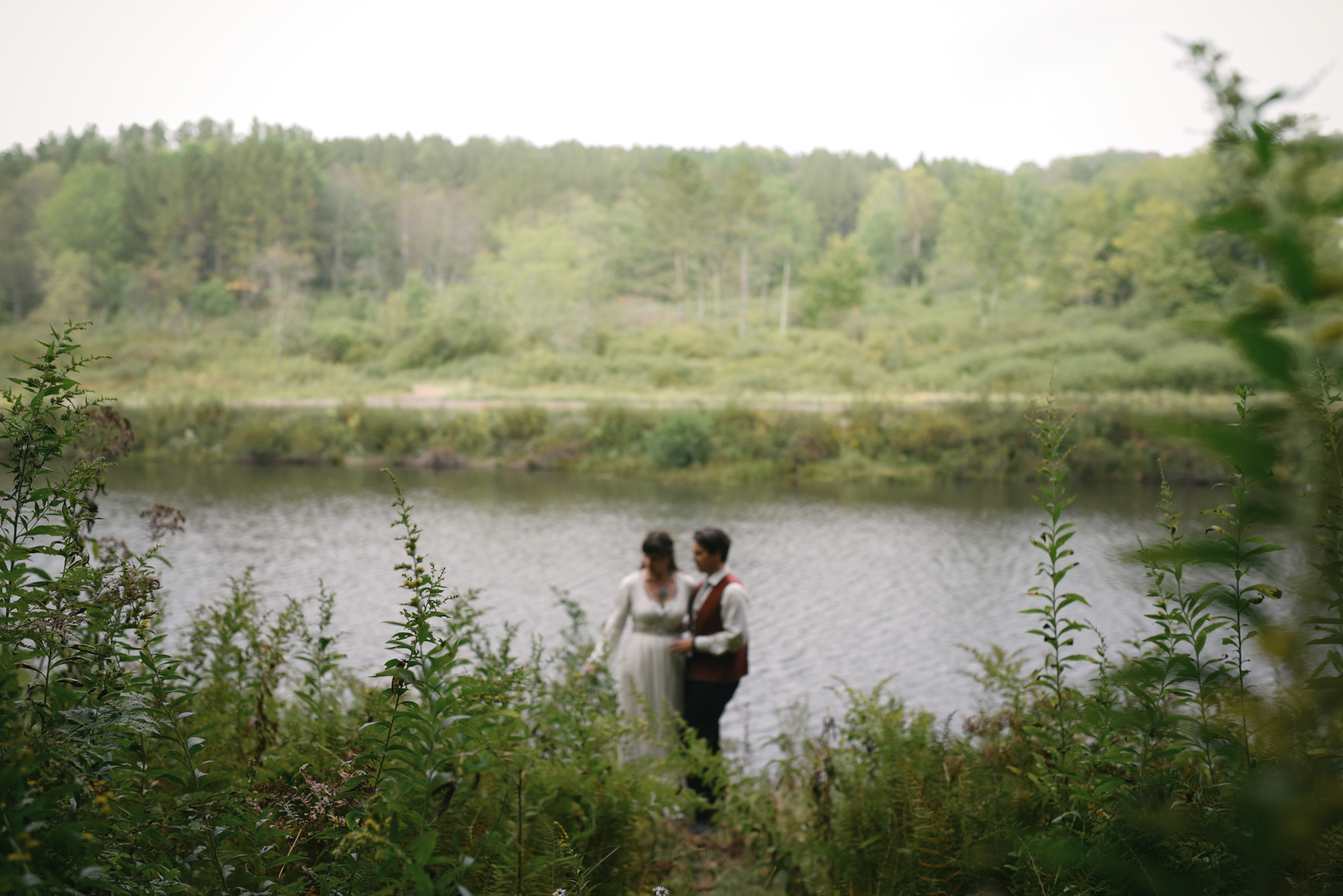  Mountain Wedding, Outdoors, Rustic, West Virginia, Maryland Wedding Photographer, DIY, Casual, candid photo of bride and groom alongside river 