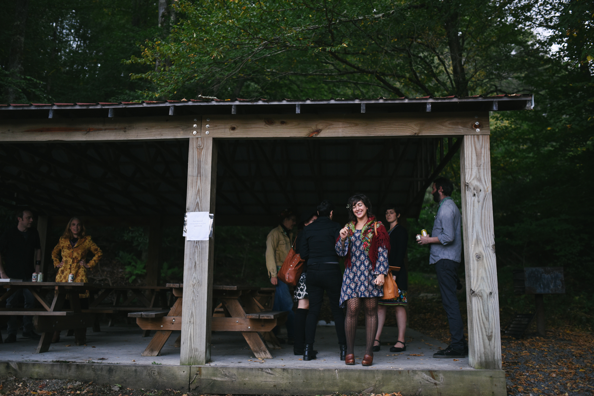  Mountain Wedding, Outdoors, Rustic, West Virginia, Maryland Wedding Photographer, DIY, Casual, candid photo of friends at picnic tables 