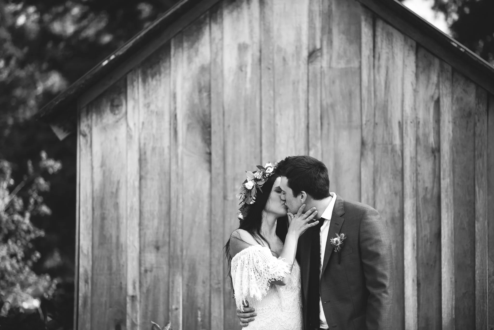 Maryland, Eastern Shore, Baltimore Wedding Photographer, Romantic, Boho, Backyard Wedding, Nature, Black and White Photo, Bride and Groom Kissing, Michael Designs Florist, Daughters of Simone Dress