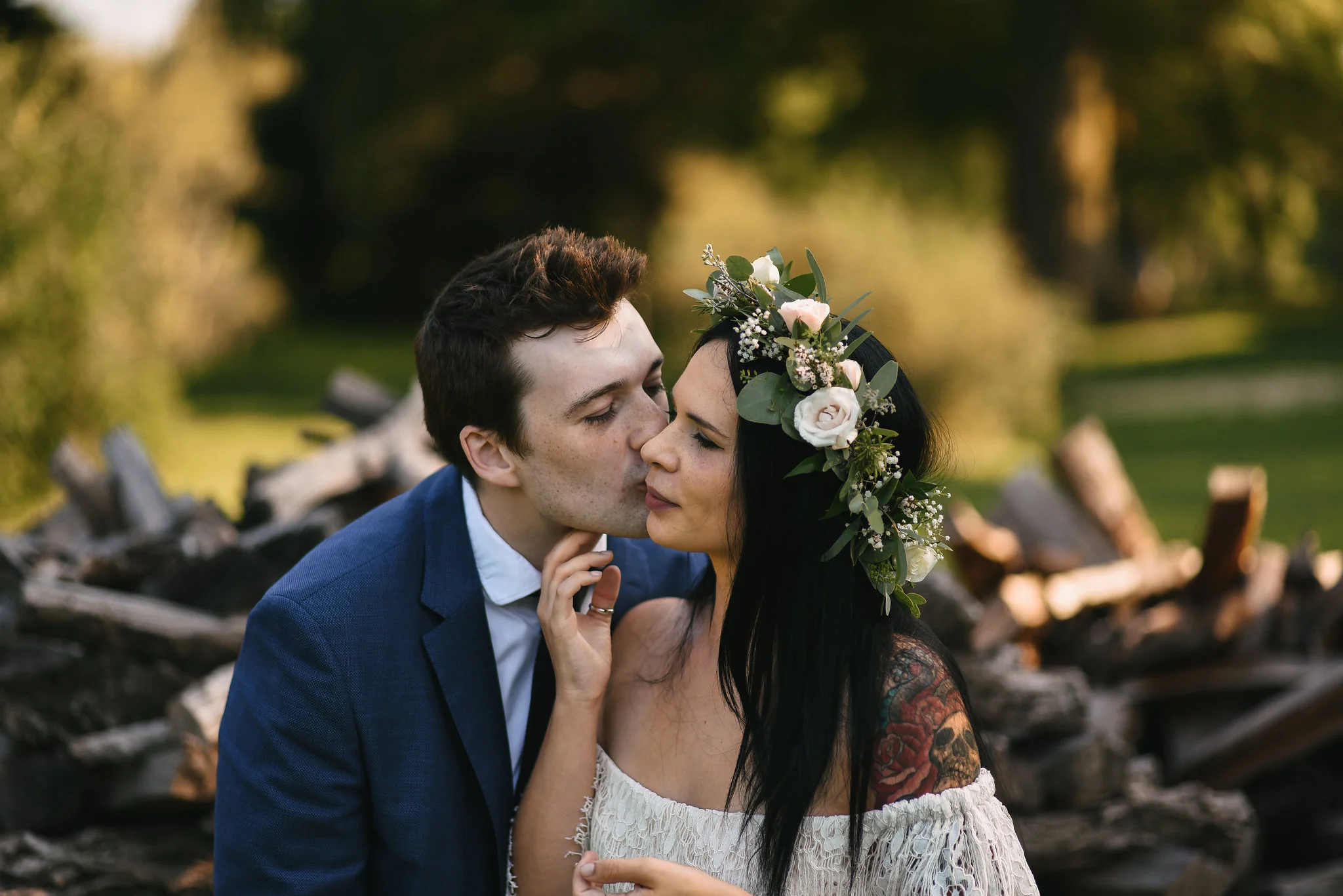 Maryland, Eastern Shore, Baltimore Wedding Photographer, Romantic, Boho, Backyard Wedding, Nature, Groom Kissing Bride on the Cheek, Michael Designs Florist, Tattooed Bride