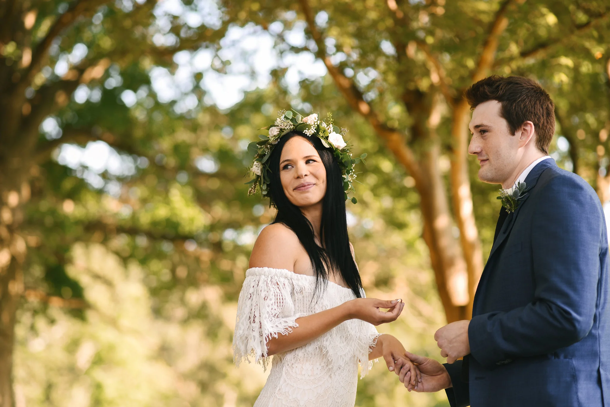 Maryland, Eastern Shore, Baltimore Wedding Photographer, Romantic, Boho, Backyard Wedding, Nature, Bride and Groom Smiling at Guests While Exchanging Rings