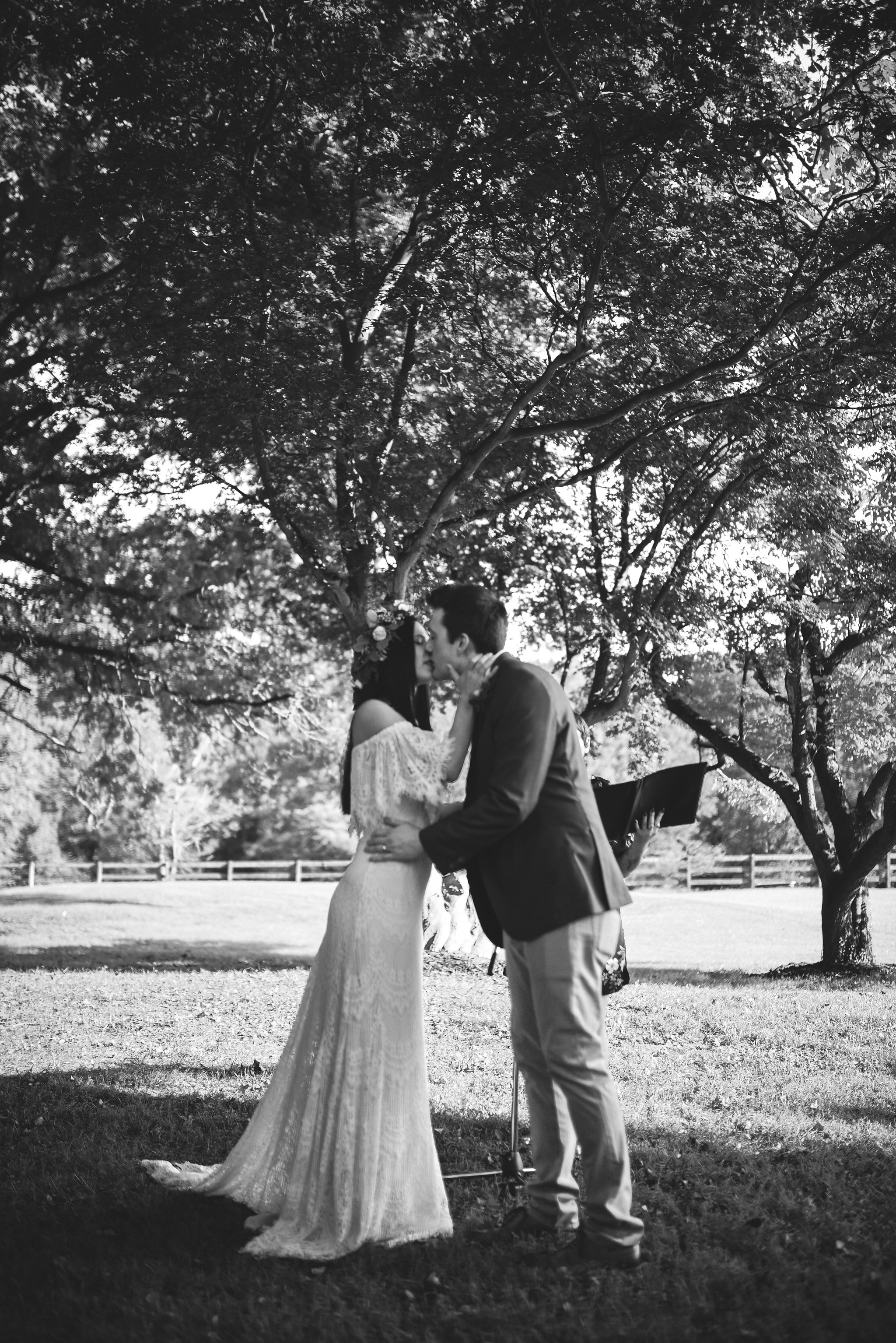  Maryland, Eastern Shore, Baltimore Wedding Photographer, Romantic, Boho, Backyard Wedding, Nature, Black and White Photo, First Kiss, Bride and Groom Share First Kiss 