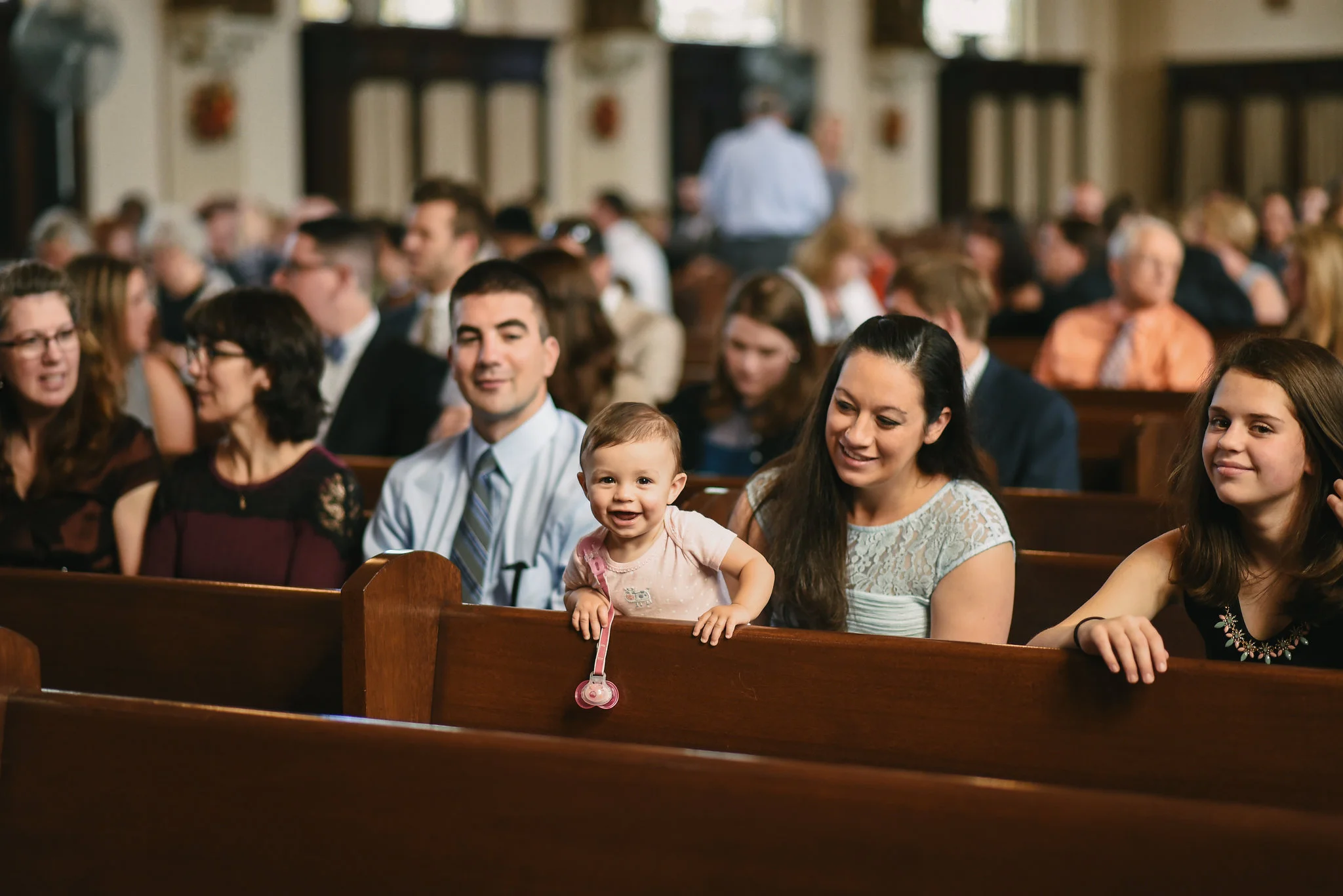 Baltimore, Canton, Church Wedding, Modern, Outdoors, Maryland Wedding Photographer, Romantic, Classic, St. Casimir Church, Guests being seated for ceremony, Wedding Guest with Baby