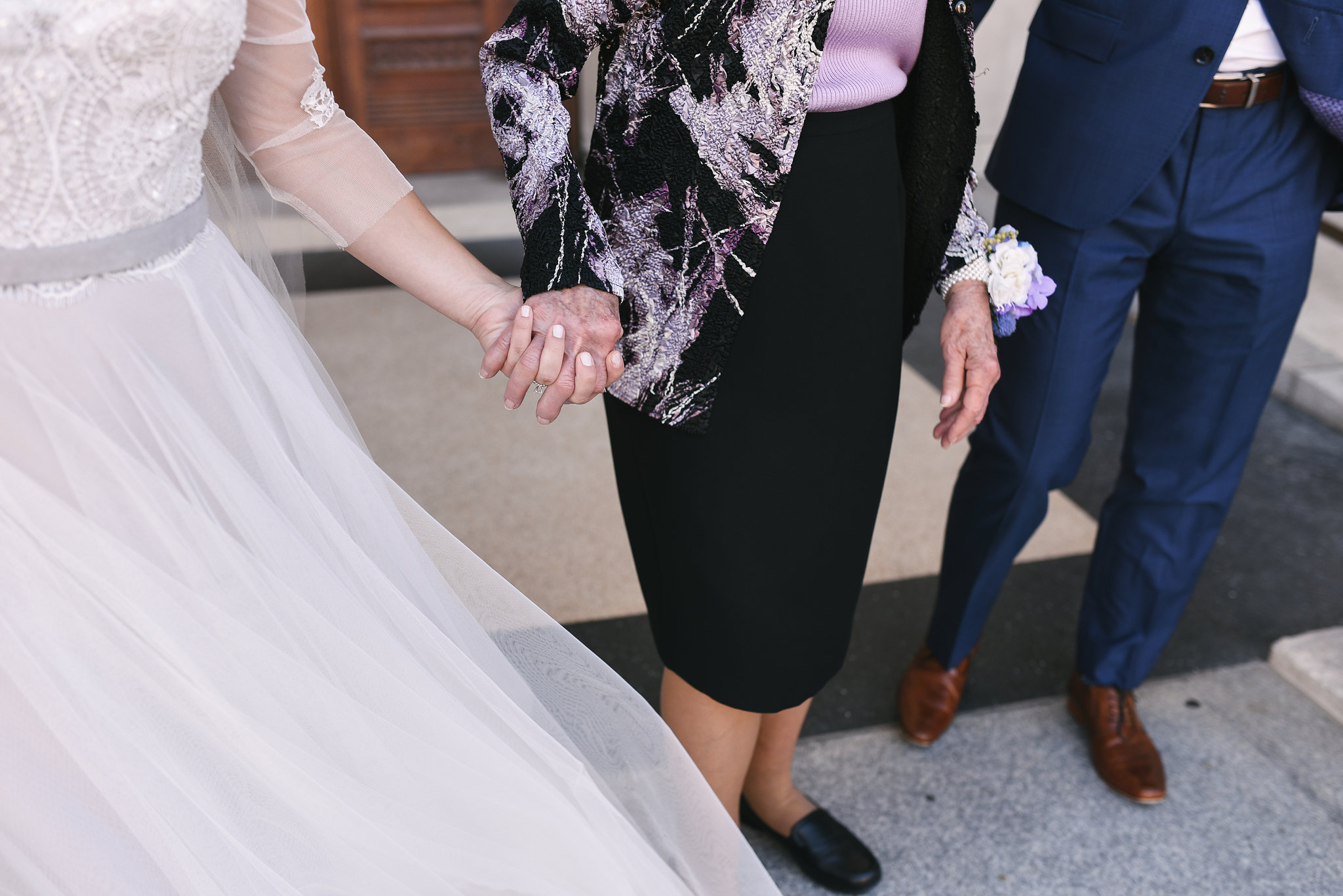 Baltimore, Canton, Church Wedding, Modern, Outdoors, Maryland Wedding Photographer, Romantic, Classic, St. Casimir Church, Bride holding hands with family, lace and tulle wedding dress 