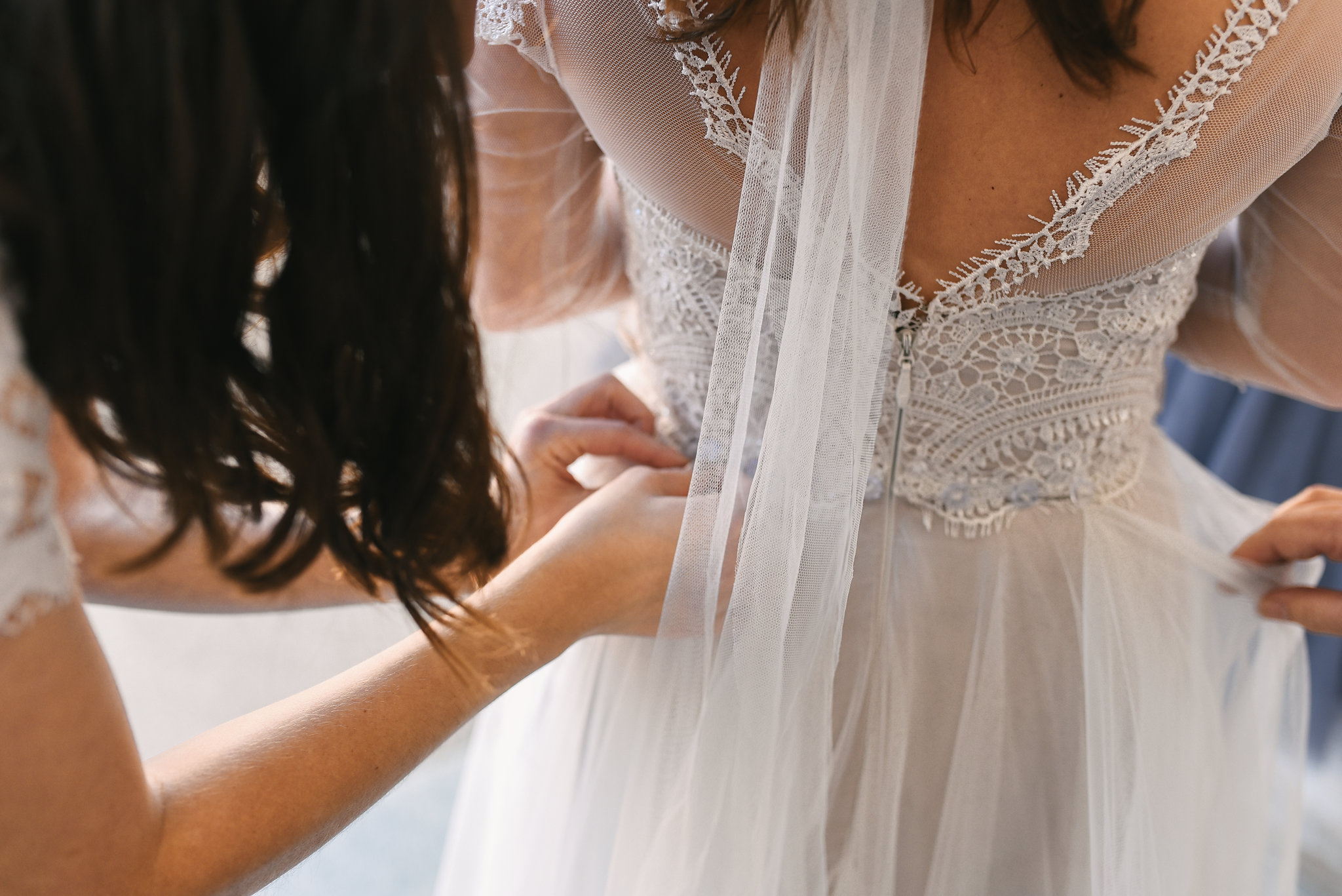  Baltimore, Canton, Church Wedding, Modern, Outdoors, Maryland Wedding Photographer, Romantic, Classic, Bridesmaid helping bride get ready, finishing touches, lace wedding dress 