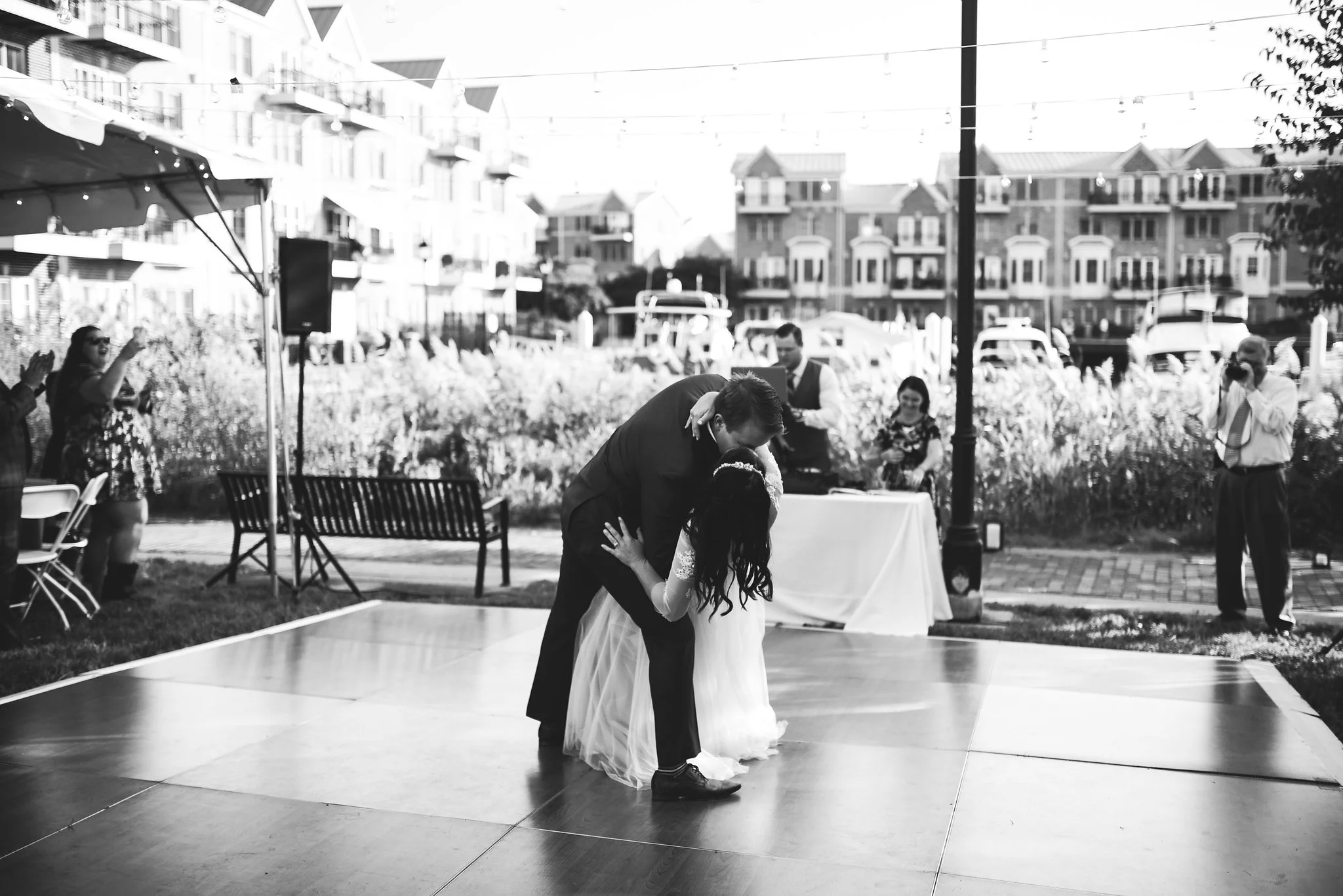 Baltimore, Canton, Church Wedding, Modern, Outdoors, Maryland Wedding Photographer, Romantic, Classic, St. Casimir Church, Black and white photo, Groom dipping Bride on dancefloor, Bride and Groom kiss at reception