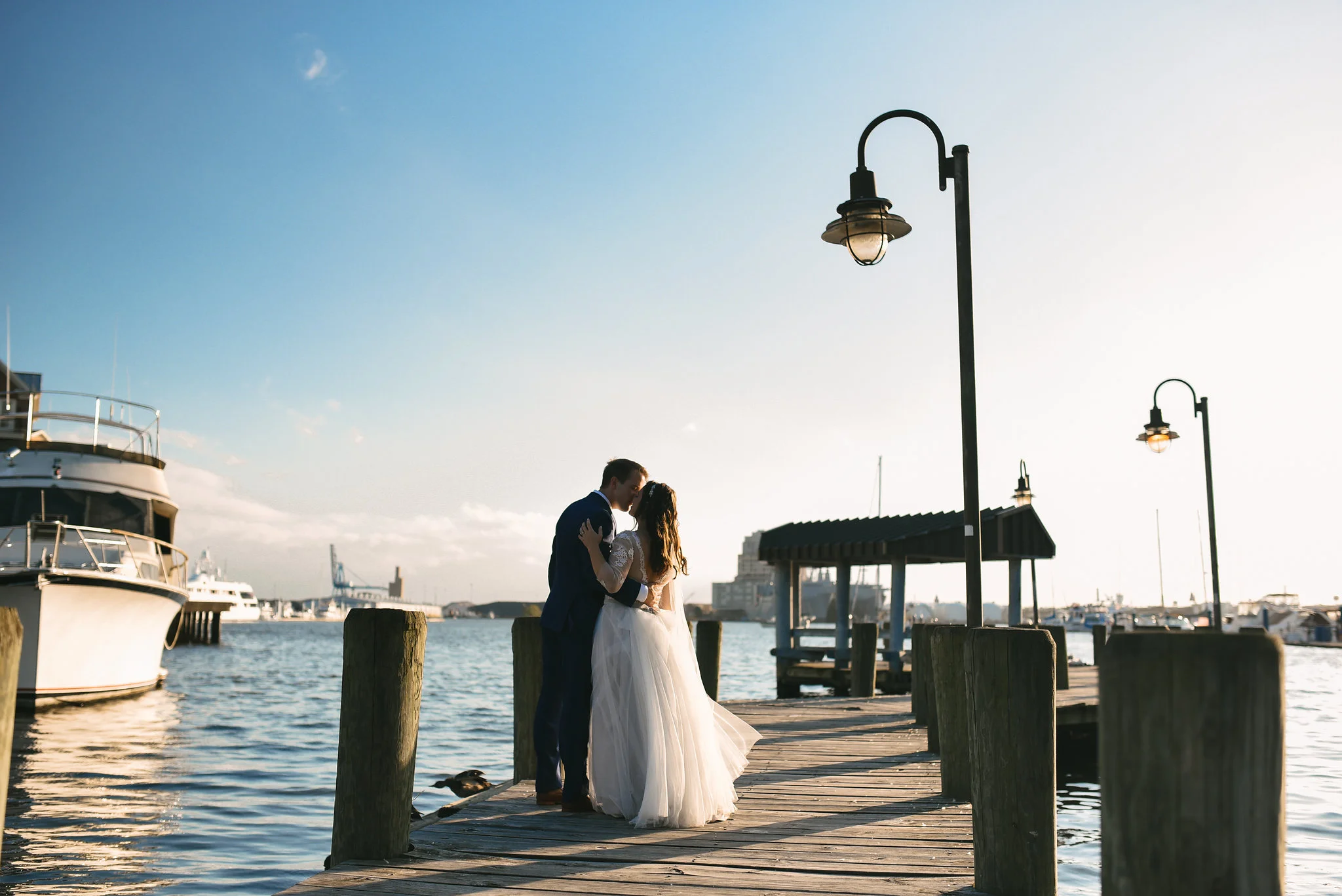 Baltimore, Canton, Modern, Outdoor Reception, Maryland Wedding Photographer, Romantic, Classic, Boston Street Pier Park, Bride and Groom kissing at Waterfront, Portrait