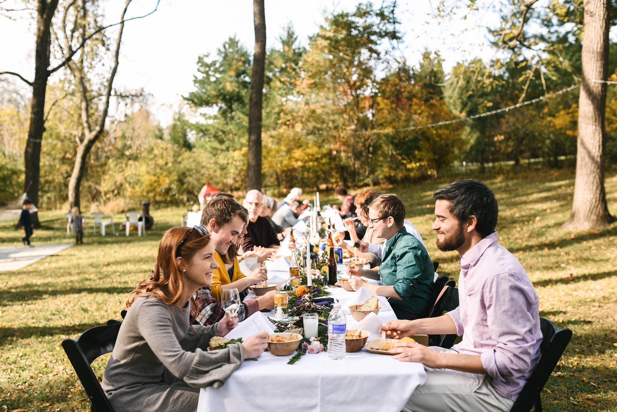 Baltimore, Maryland Wedding Photographer, Backyard Wedding, DIY, Rustic, Casual, Fall Wedding, Woodland, Friends and Family Sitting at Banquet Table Enjoying Food, Crooked Fence Farm