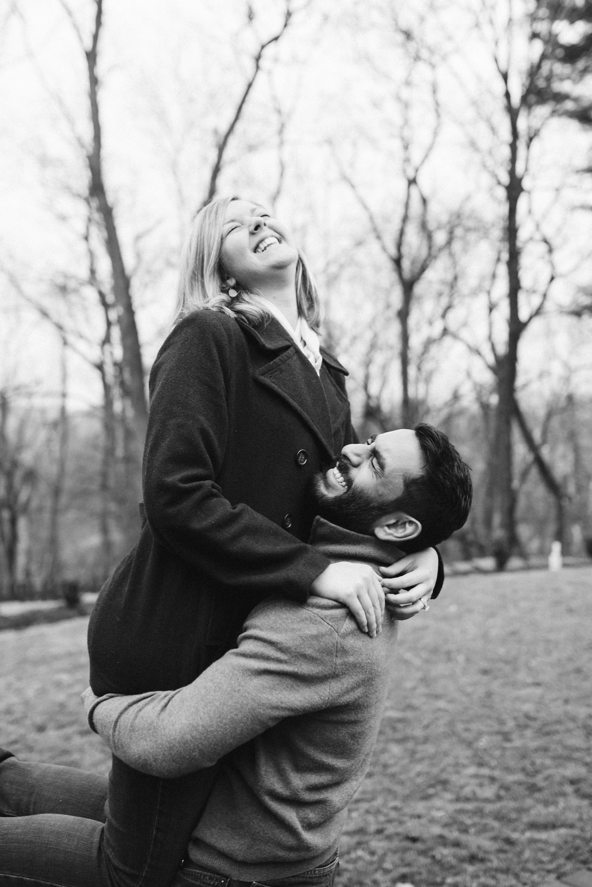 Engagement Photos, Rainy, Ellicott City, Maryland Wedding Photographer, Winter, Overhills Mansion, Classic, Traditional, Outdoor, Groom Lifting Bride, Black and White Photo