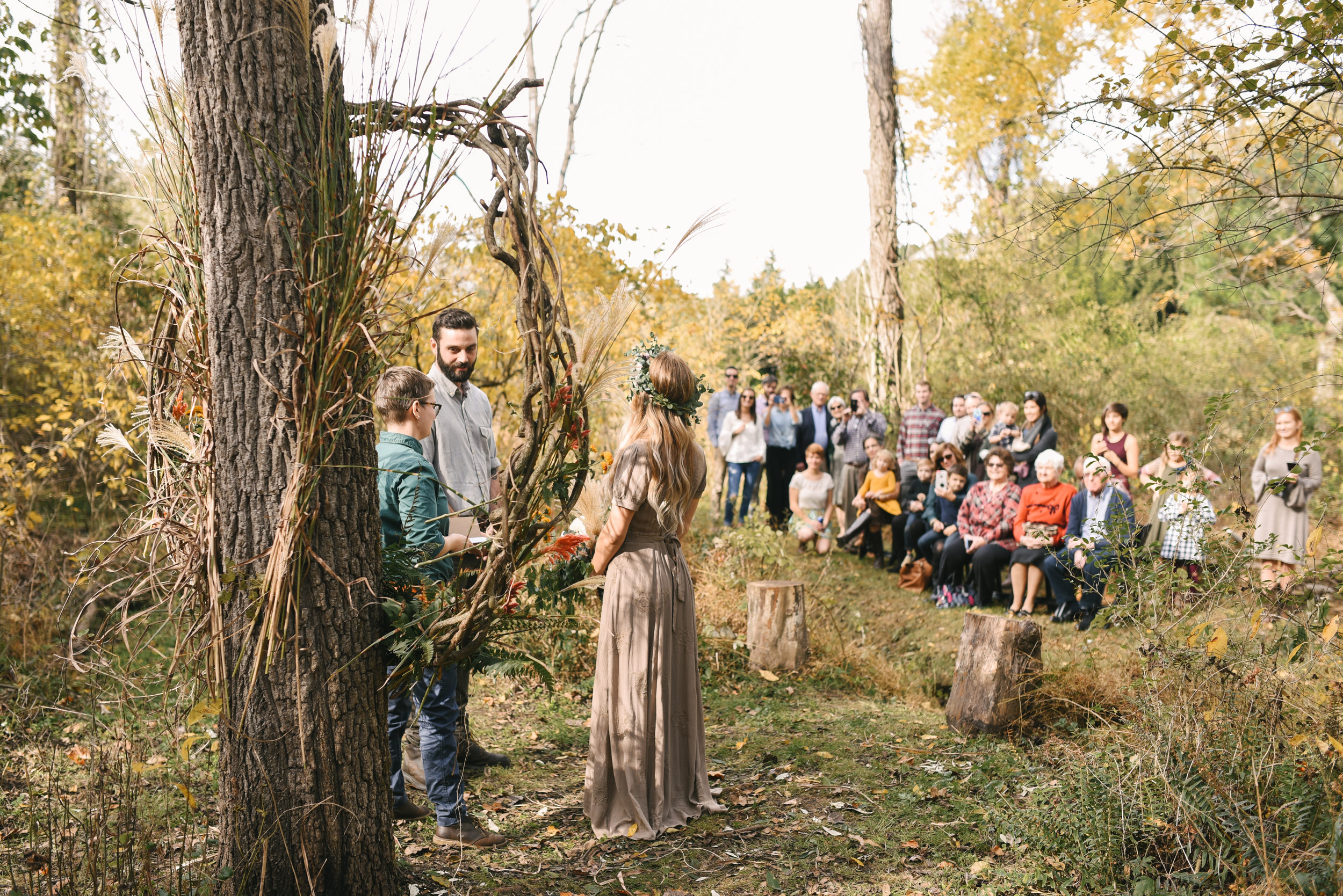  Baltimore, Maryland Wedding Photographer, Backyard Wedding, DIY, Rustic, Casual, Fall Wedding, Woodland, Couple Standing in Front of Wreath 