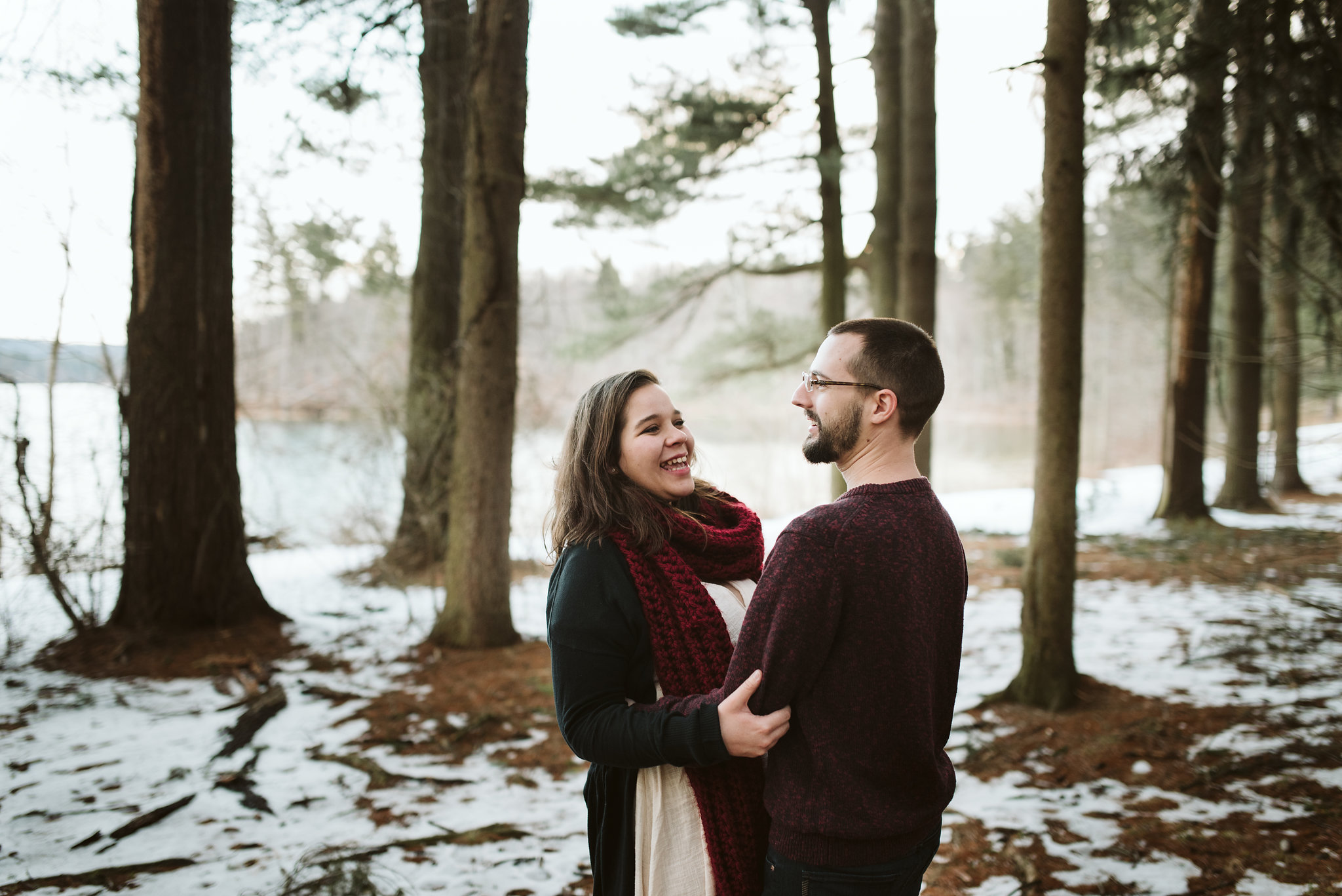 Baltimore County, Loch Raven Reservoir, Maryland Wedding Photographer, Winter, Engagement Photos, Nature, Romantic, Clean and Classic, Bride and Groom Laughing Together Outside with Snow on the Ground 