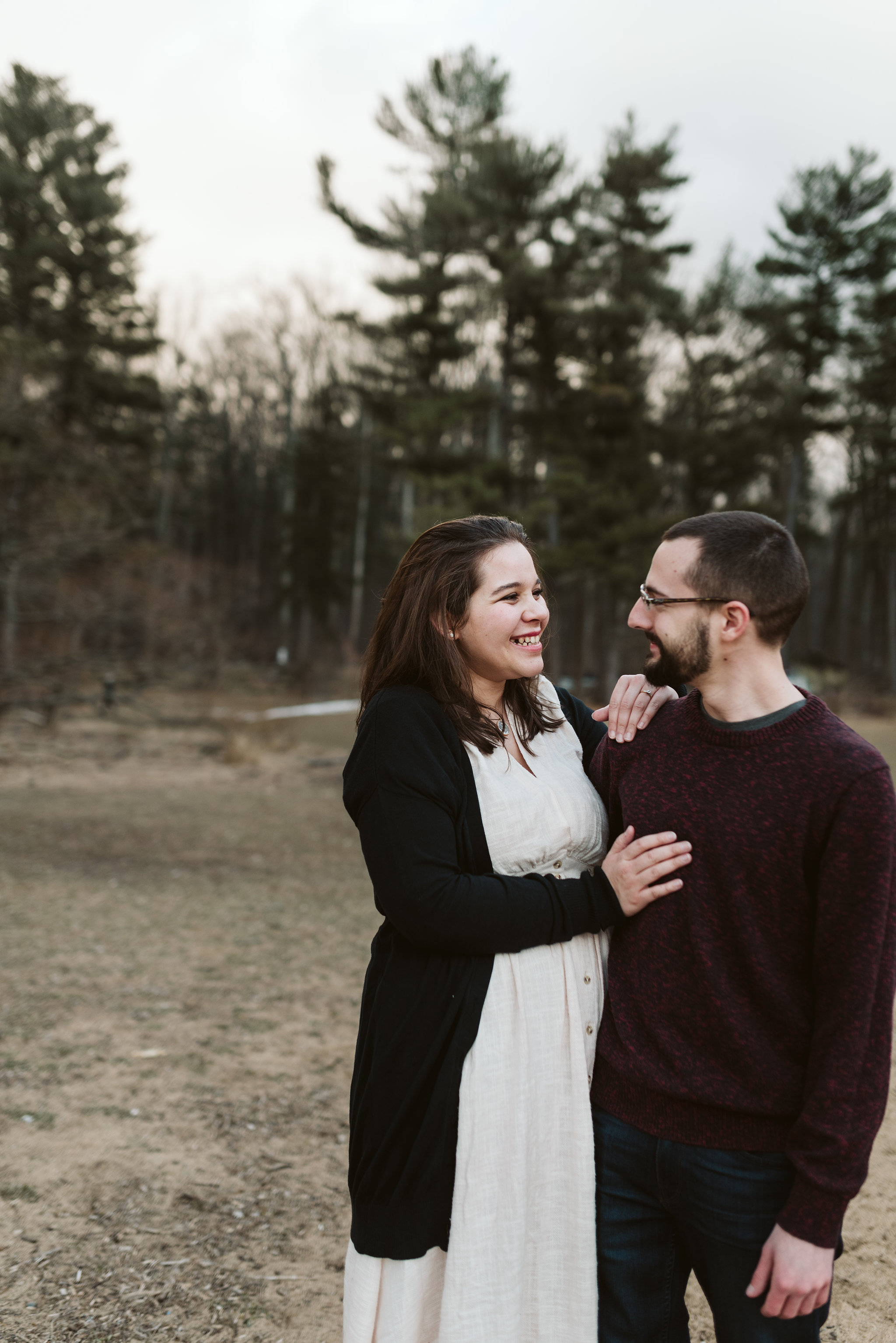  Baltimore County, Loch Raven Reservoir, Maryland Wedding Photographer, Winter, Engagement Photos, Nature, Romantic, Clean and Classic, Couple Laughing Together in the Forest 