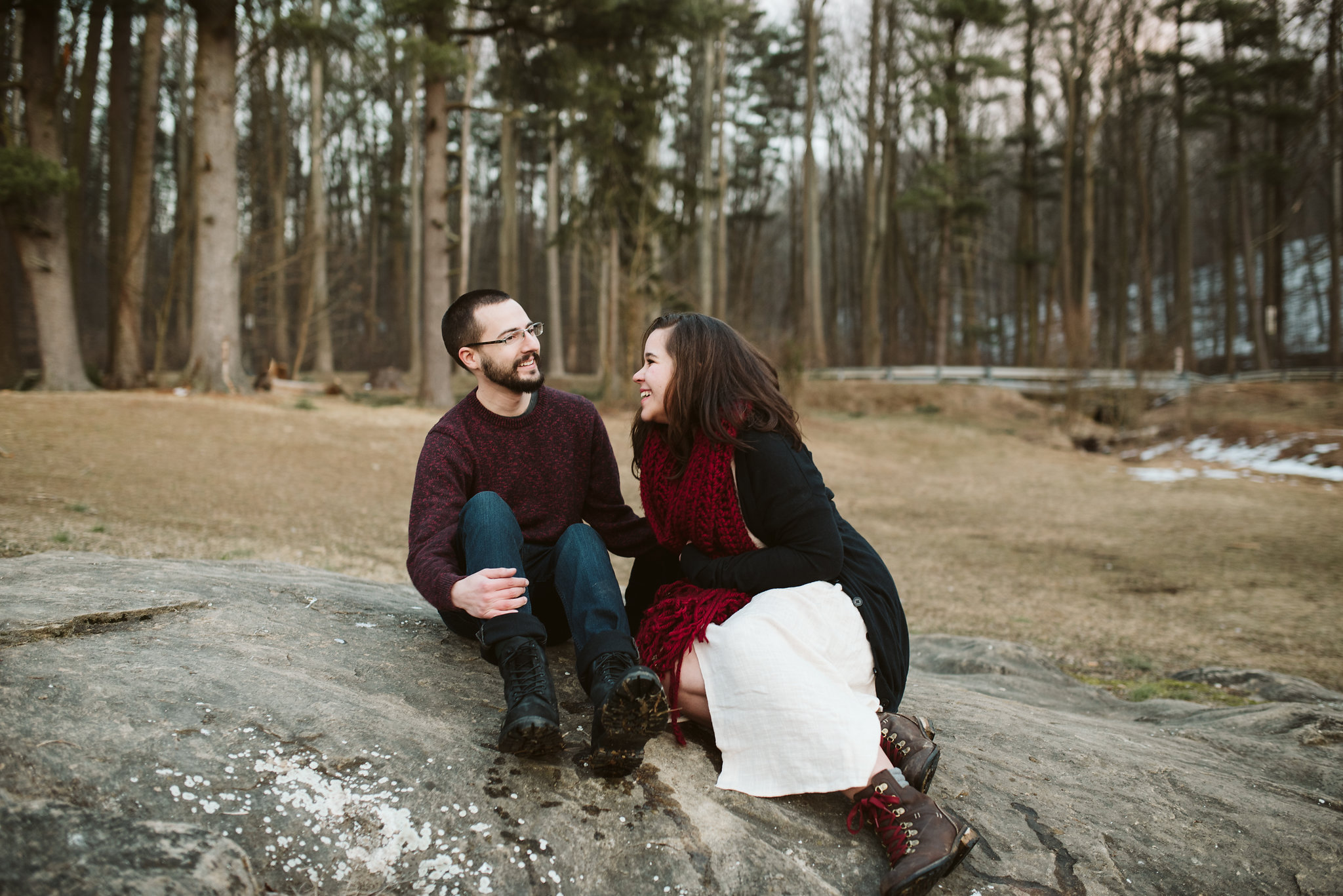  Baltimore County, Loch Raven Reservoir, Maryland Wedding Photographer, Winter, Engagement Photos, Nature, Romantic, Clean and Classic, Couple Laughing Together While Sitting on a Rock, Cold Morning, Spring 