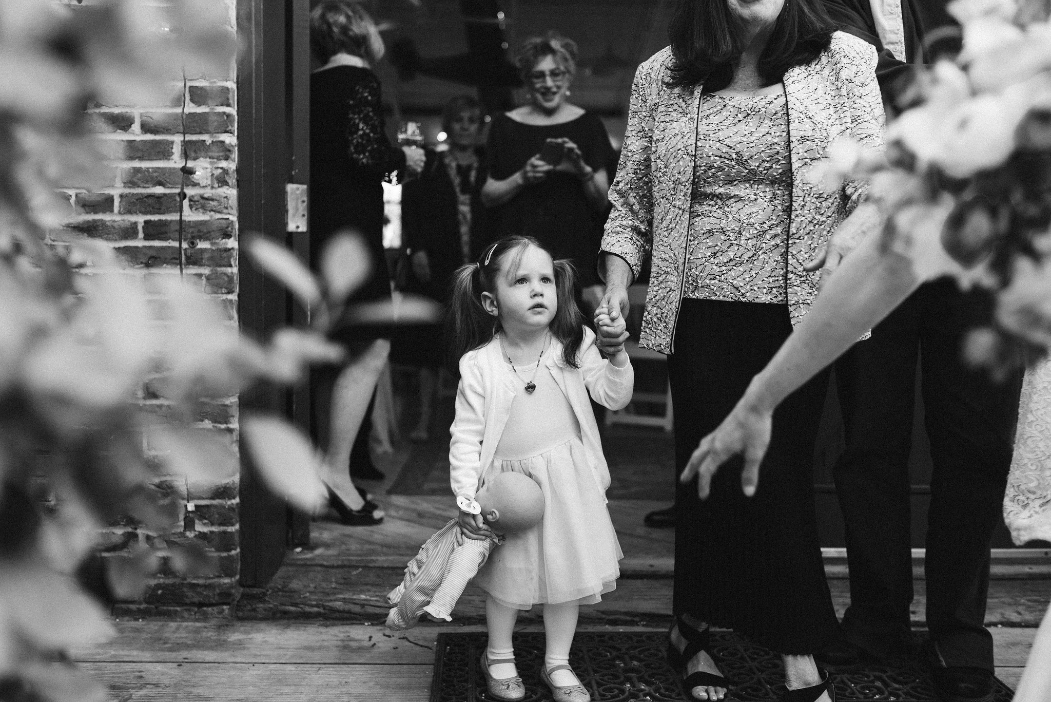  Baltimore, Maryland Wedding Photographer, Hampden, Eco-Friendly, Green, The Elm, Simple and Classic, Vintage, Flower Girl Looking at Bride During Reception, Black and White Photo 