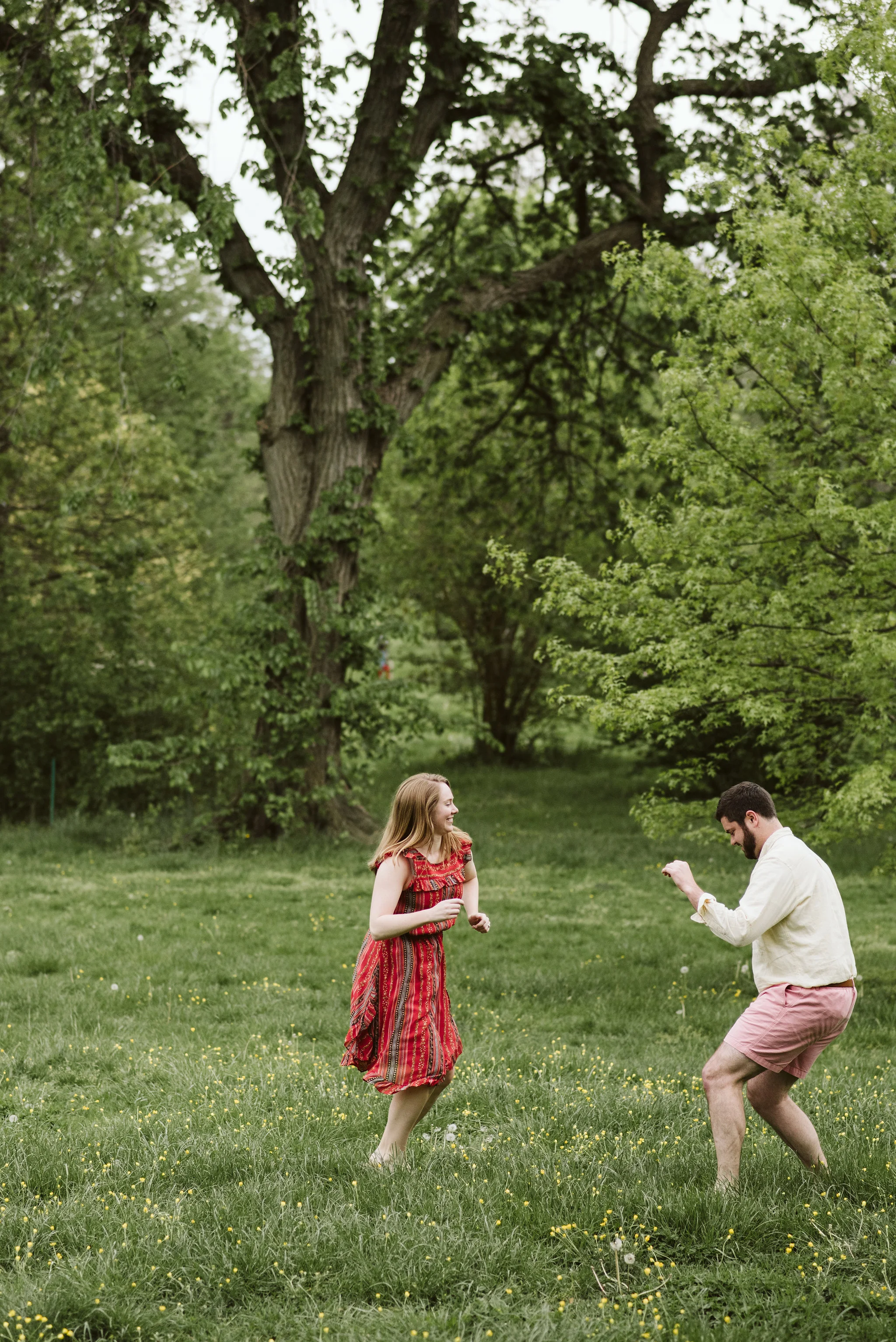Engagement Photos, Patterson Park, Baltimore, Maryland Wedding Photographer, Casual, Fun, Nature, Couple Dancing Together in a Field