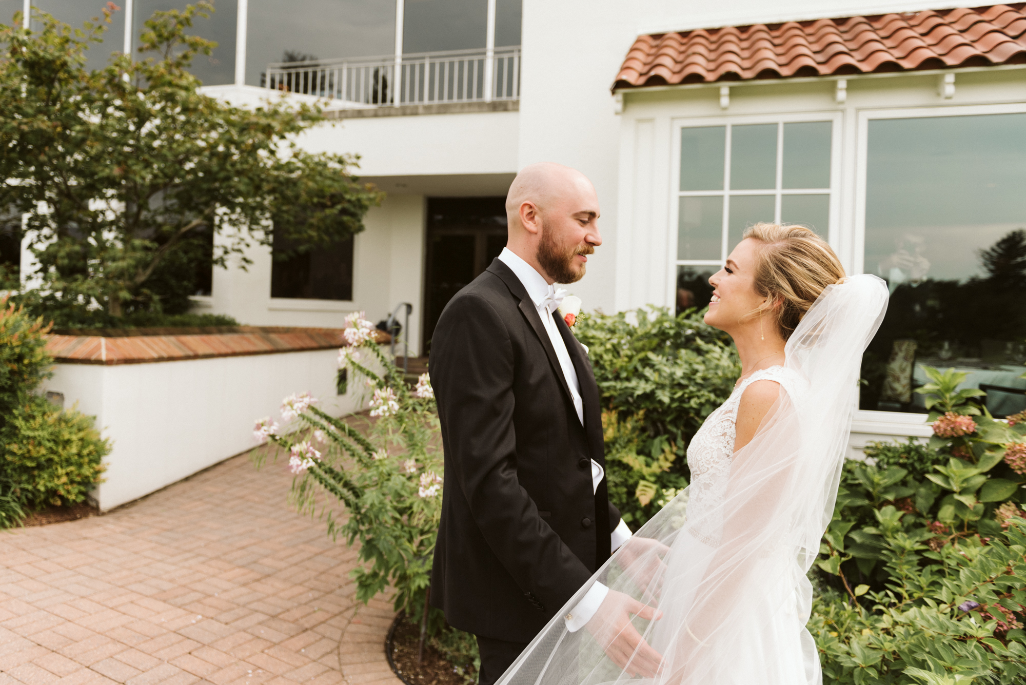 Elegant, Columbia Country Club, Chevy Chase Maryland, Baltimore Wedding Photographer, Classic, Traditional, Bride and Groom First Look, Couple Laughing and Holding Hands