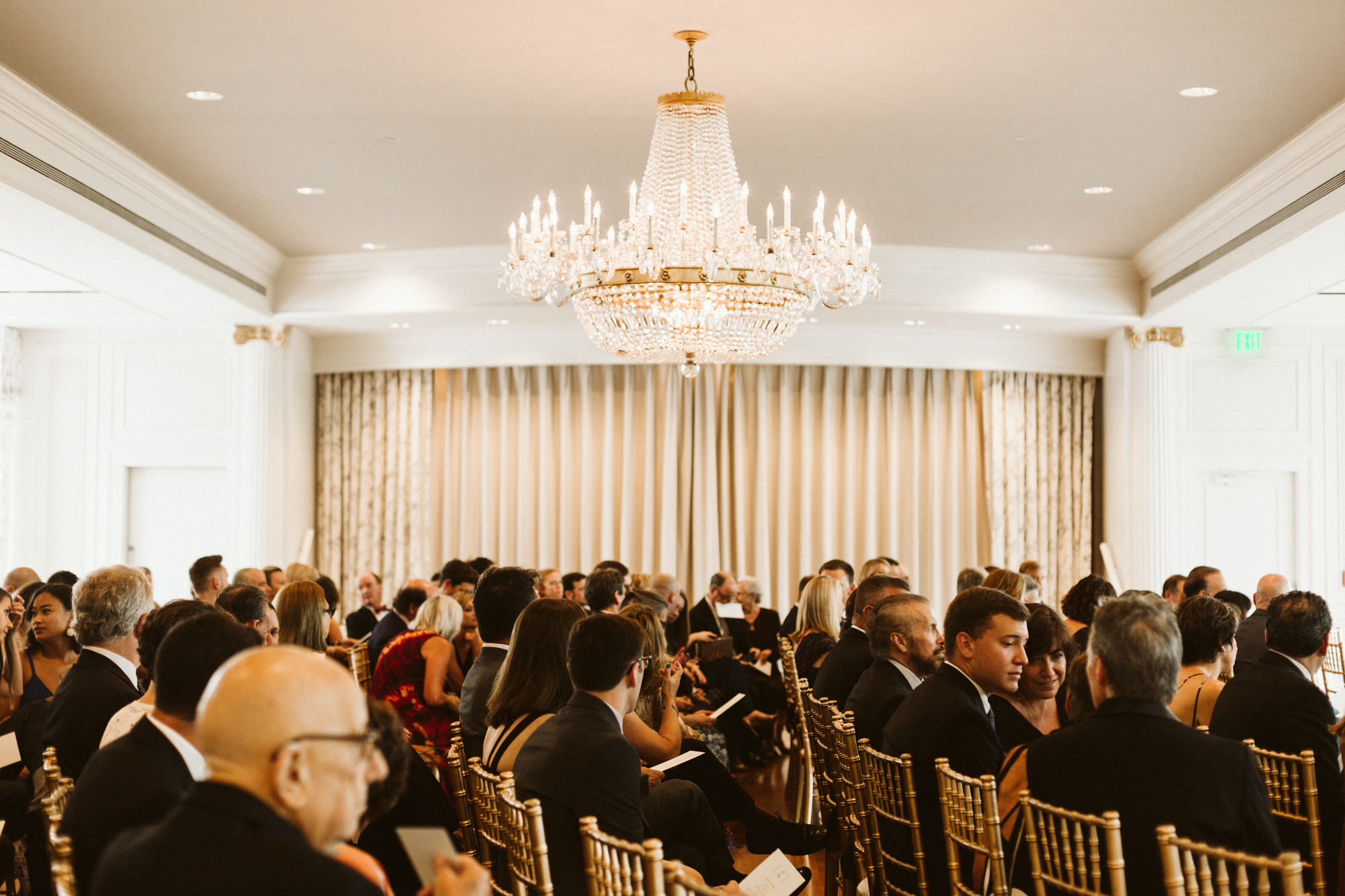 Elegant, Columbia Country Club, Chevy Chase Maryland, Baltimore Wedding Photographer, Classic, Traditional, Jewish Wedding, Crystal Chandelier, Guests awaiting Ceremony, Gold Ceremony Chairs