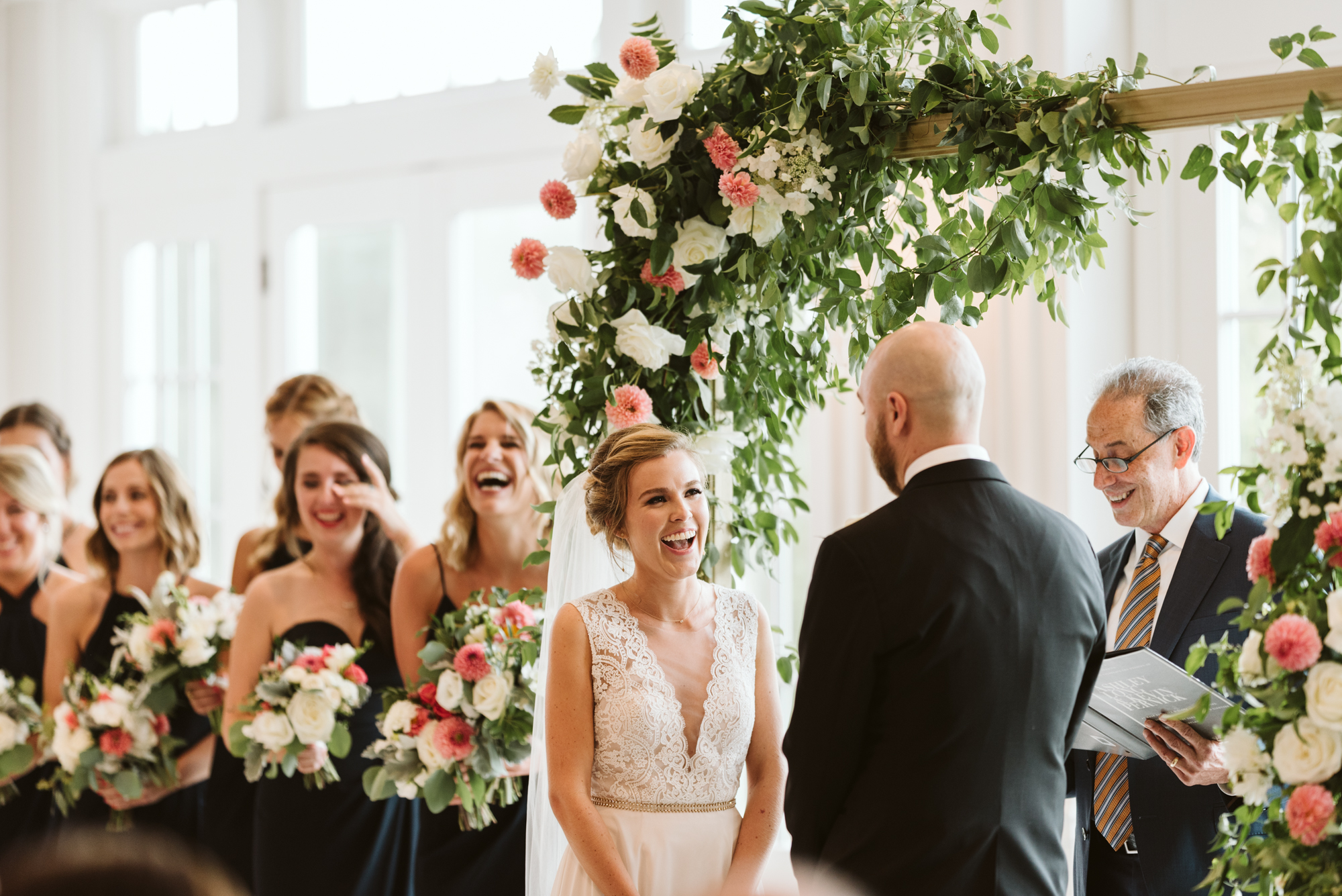 Elegant, Columbia Country Club, Chevy Chase Maryland, Baltimore Wedding Photographer, Classic, Traditional, Ceremony Photo, Meg Owen Floral Designs, Floral Archway, Exchanging Vows and Laughing