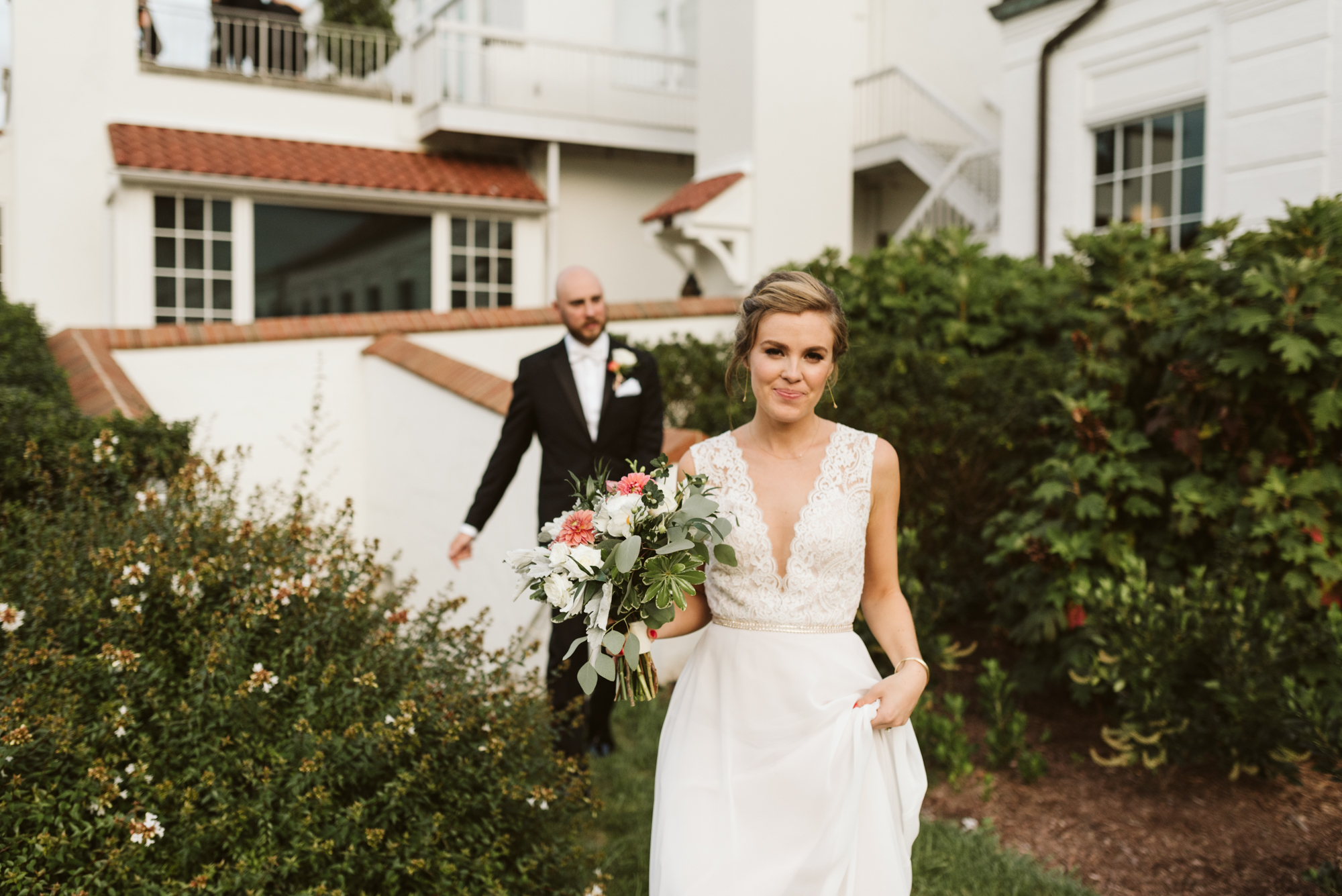 Elegant, Columbia Country Club, Chevy Chase Maryland, Baltimore Wedding Photographer, Classic, Traditional, Bride Walking with Groom in Background, BHLDN Wedding Dress